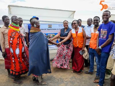 The symbolic handover of the fish dryers to the Moite community-saving group leaders by Linda Kola, the National Resilience Officer-JTiP for the International Organization for Migration (far right) together with Lilian Chebon, the Program Officer, World Vision Kenya. 