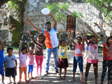 World Vision staff with children in Mexico