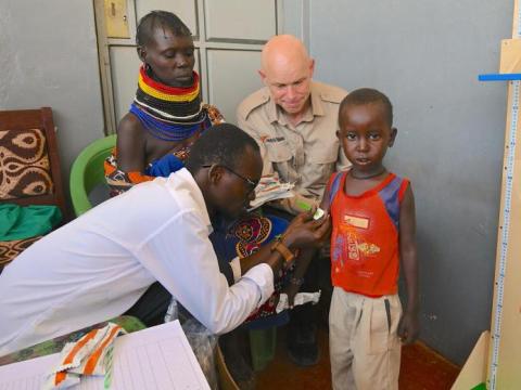 Andrew Morley, President and CEO of World Vision International, visits Turkana County, Kenya, to see a health and nutrition outreach programme led by World Vision and the World Food Programme that aims to prevent and treat malnutrition in children.