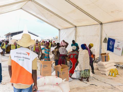 World Vision's food distribution efforts in DRC are monitored by staff members