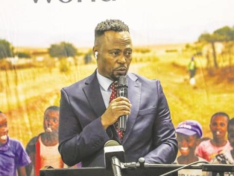A pastor speaks in Lesotho as World Vision Lesotho and the Christian Council of Lesotho launches the Faith Partnerships for Environmental Stewardship and Climate Action (ESCA) Project to combat climate change.