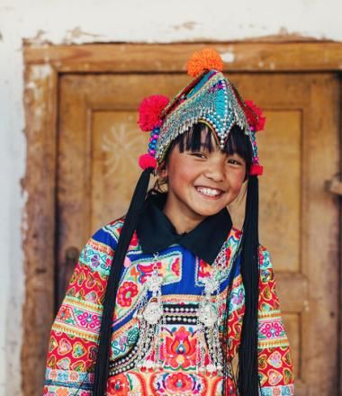 Chengzhen, 10 - sponsored child in traditional dress
