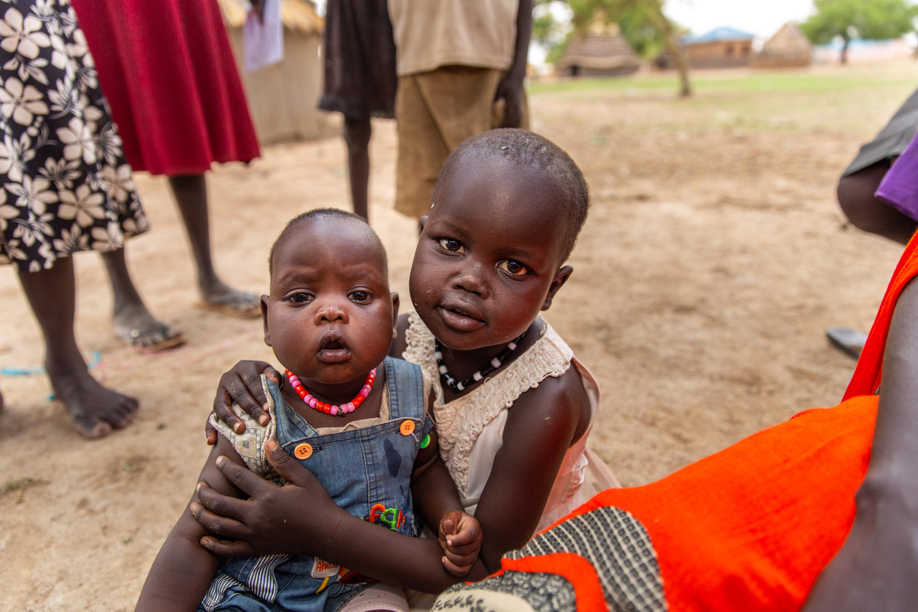 Two sudanese children in their village