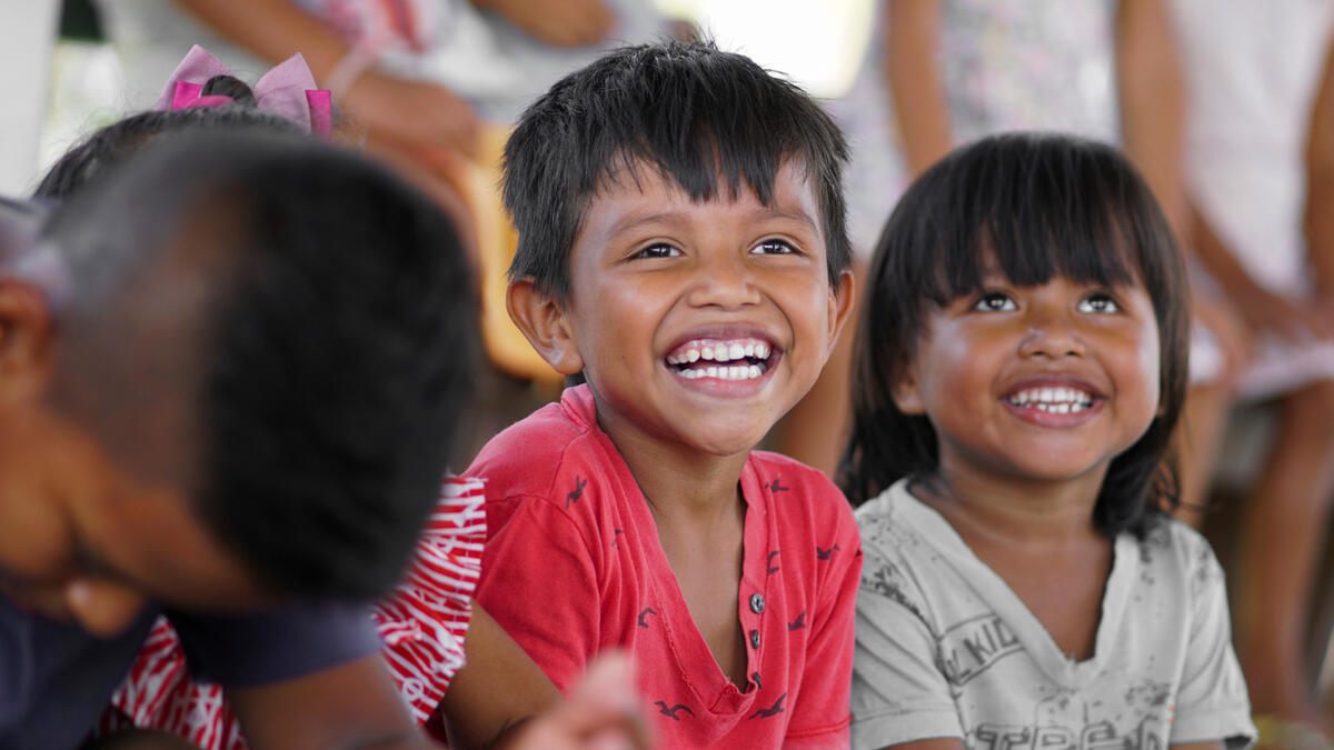Two children smiling