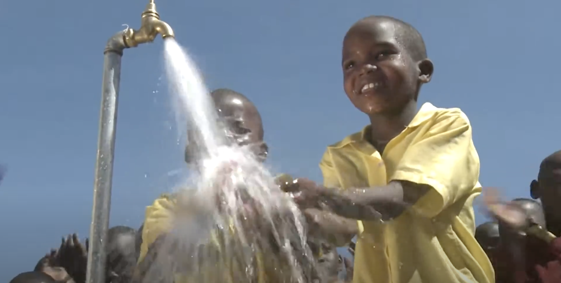 boys playing in water