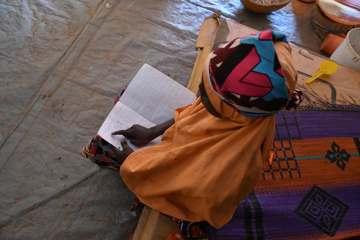 Child works on her homework