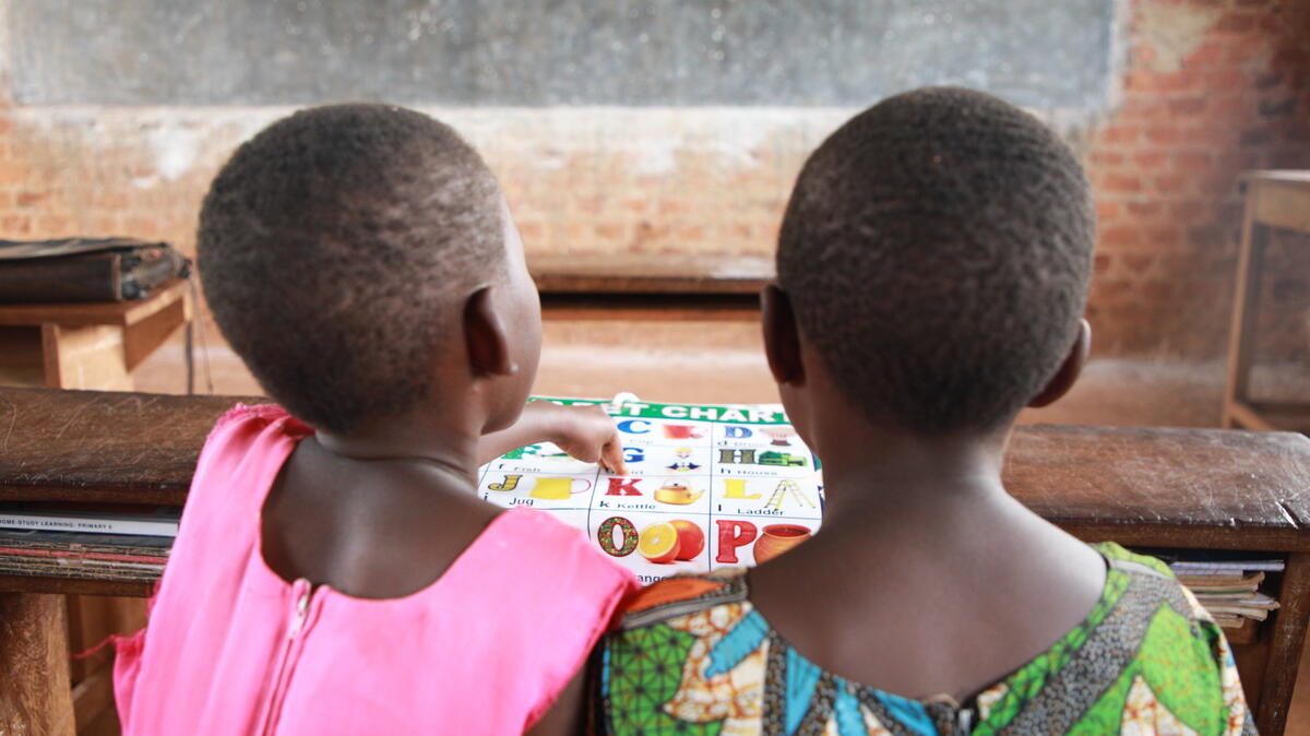 two children work on homework