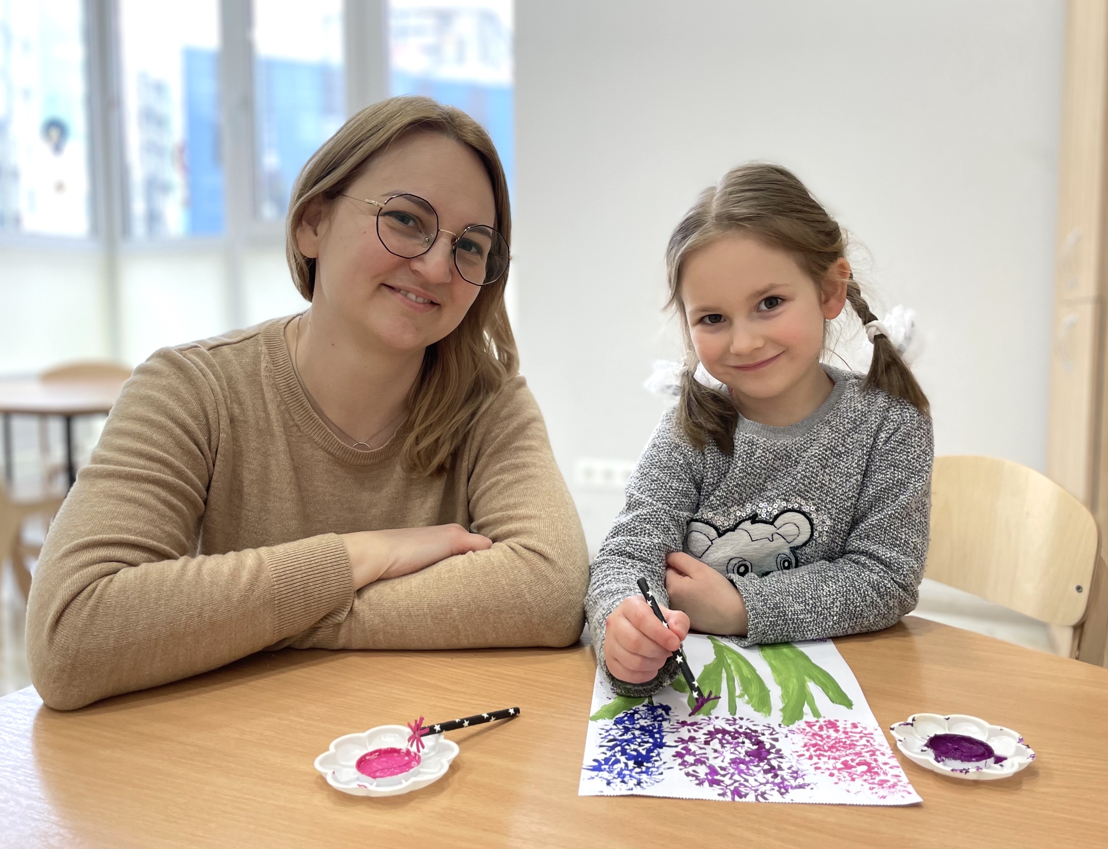 Ukrainian educators working in a modified kindergarten setting