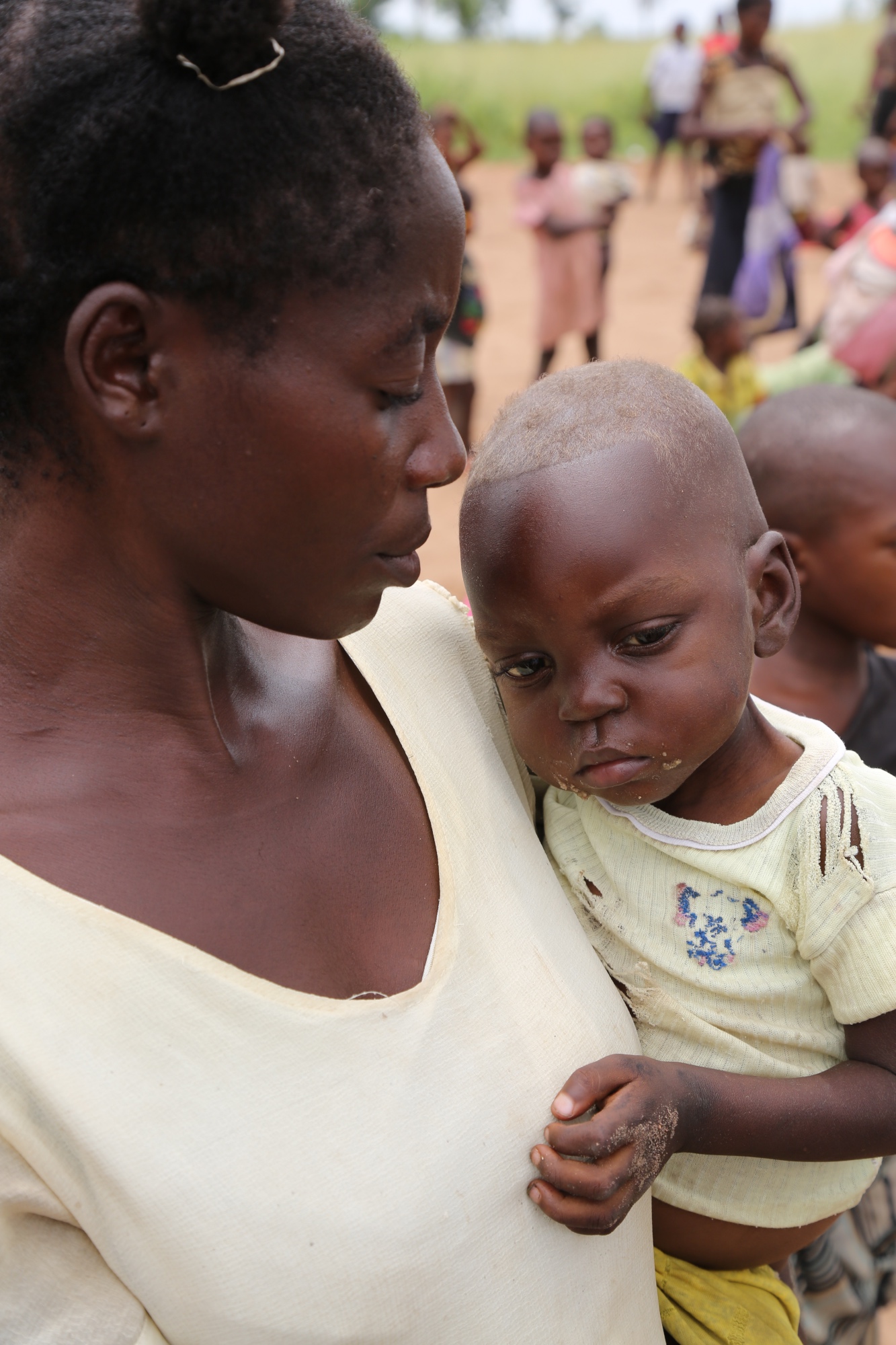 Elizabeth Mbofo, 34, a mother from Kasai in Democratic Republic of Congo and her two year old son, Fwamba. Elizabeth is concerned that her child might die from malnutrition.