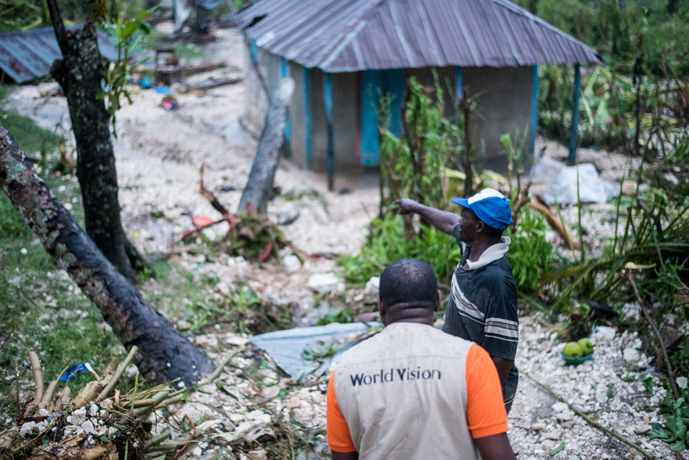 Farmers and World Vision Haiti assess the damage of Hurricane Matthew