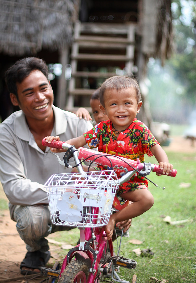 Father and son on the bike
