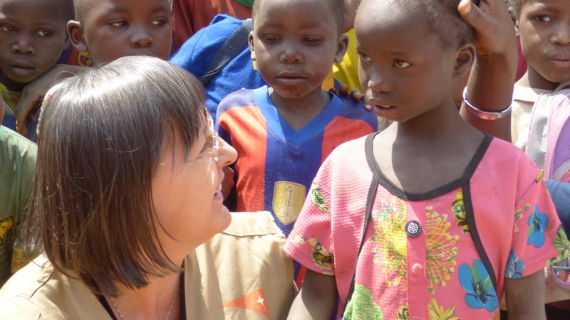 West Africa Regional Leader talks with children in Bocaranga