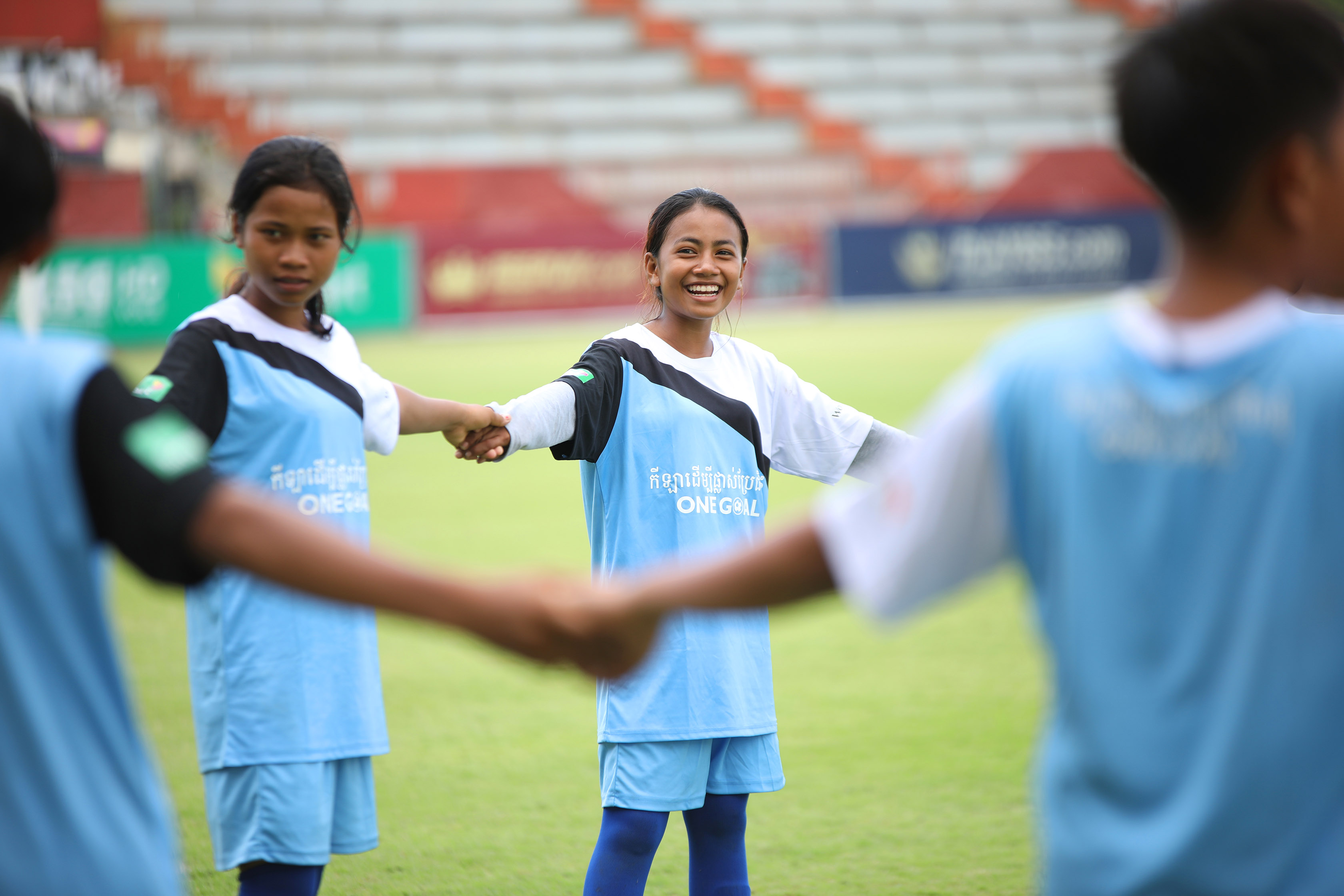 Kompheak with her team