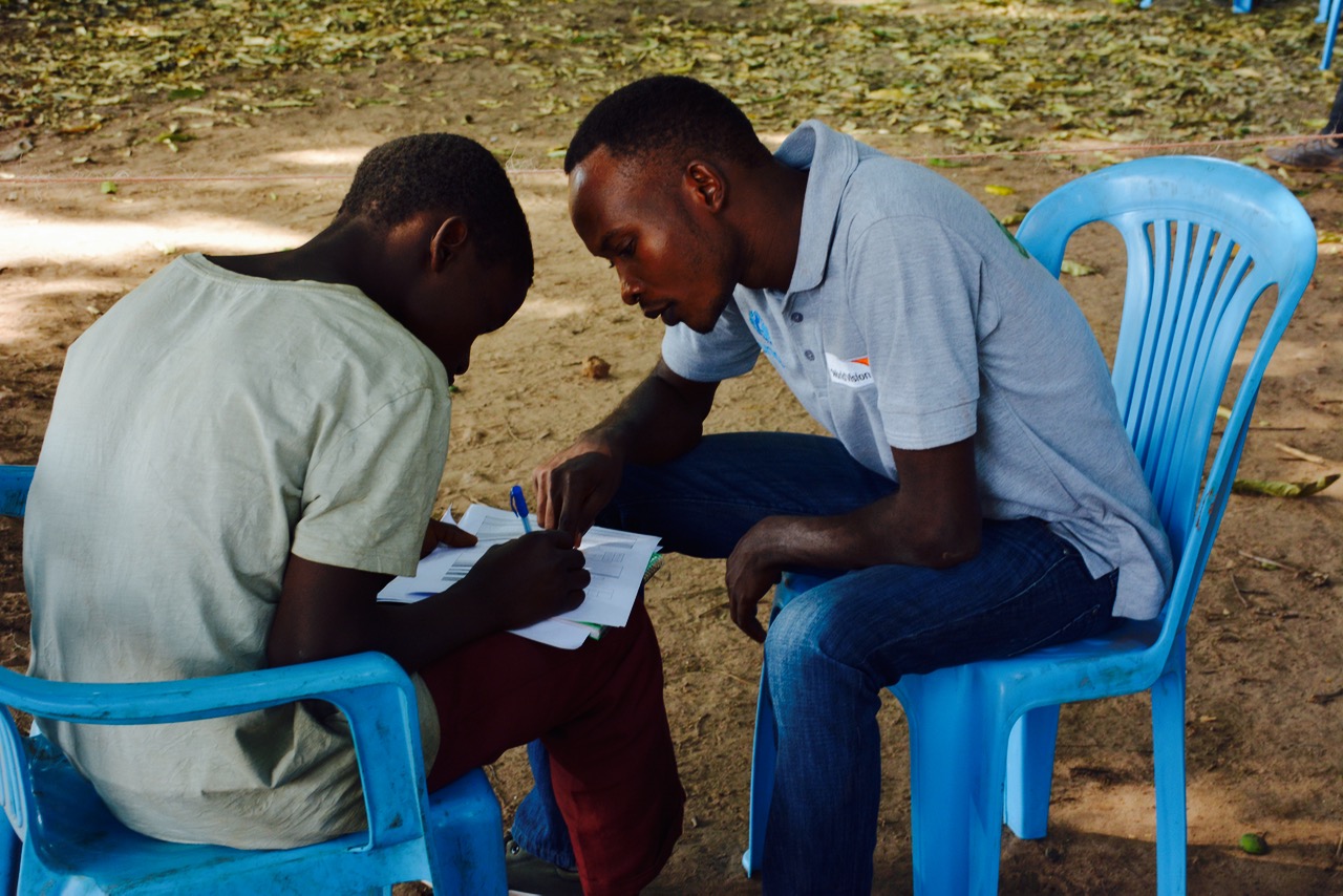 World Vision social worker and client