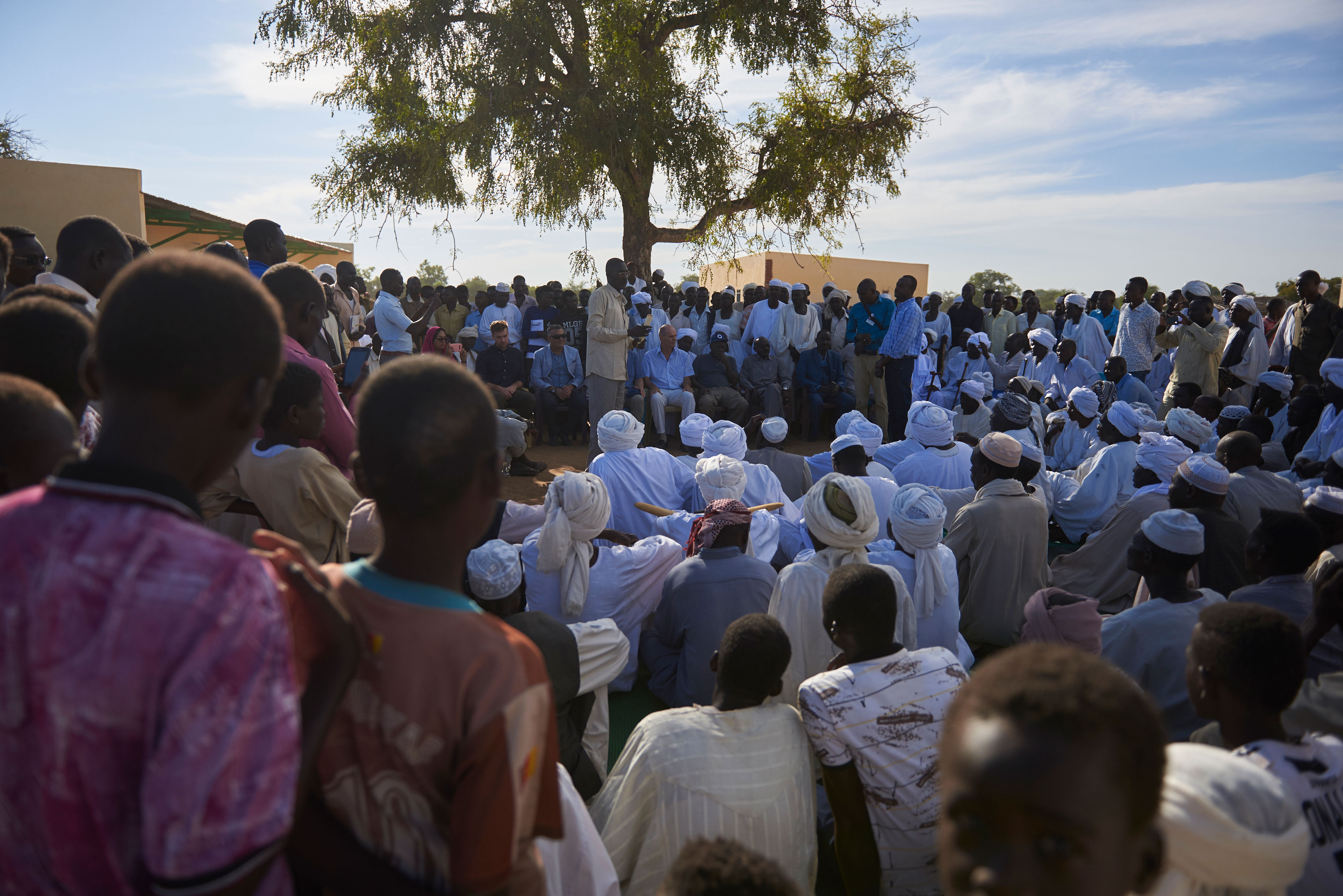 Residents in Katilya have a sit down with representatives of the UK, Swiss and Sweden embassy in Khartoum