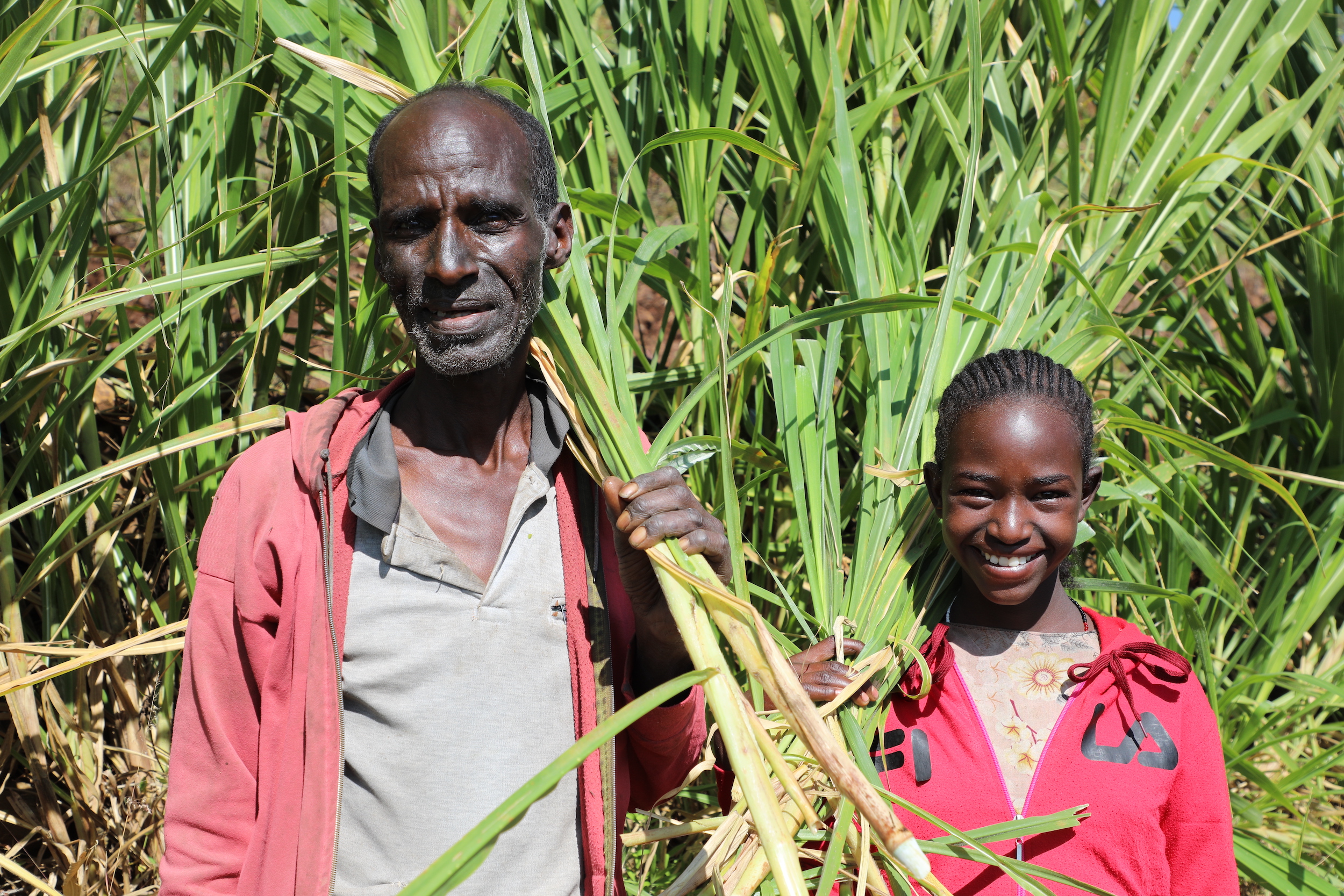 Aliyu with his daughter smiling