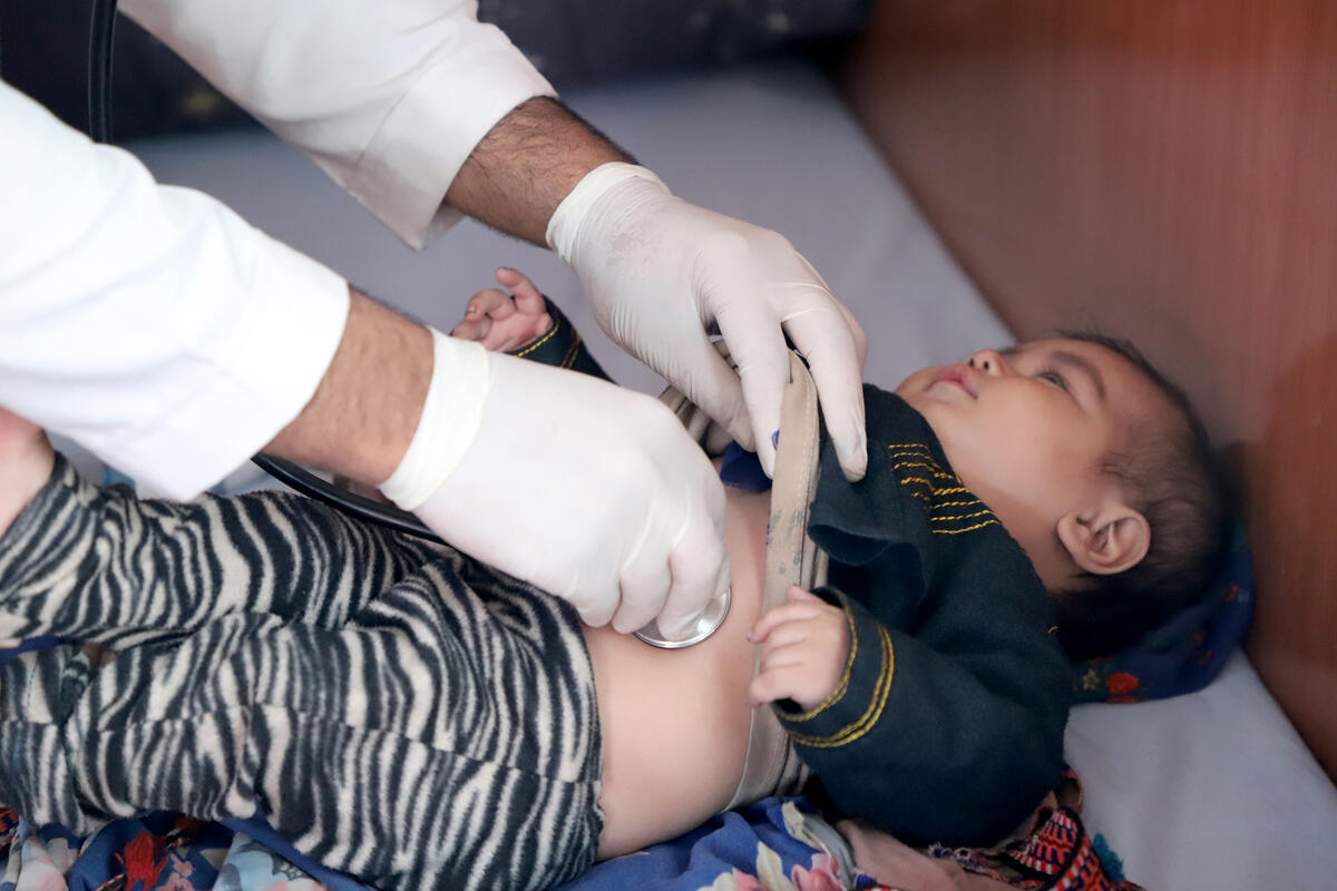 Baby is examined at clinic in Afghanistan