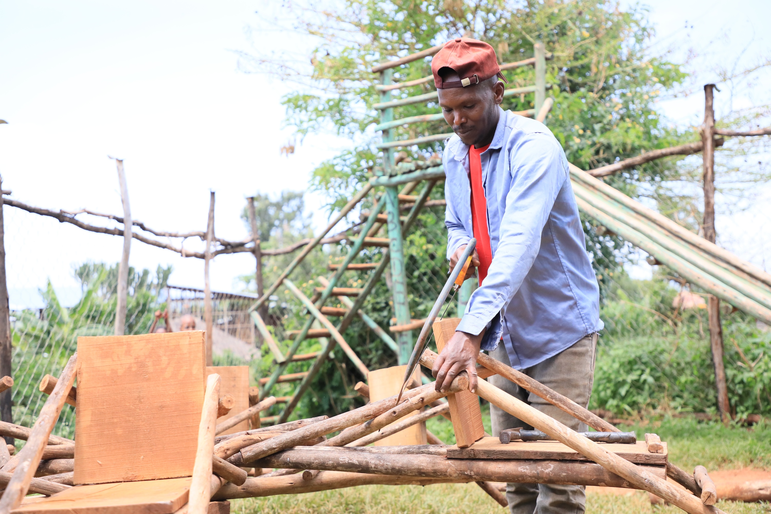 Muhammed making merry-go-round for children