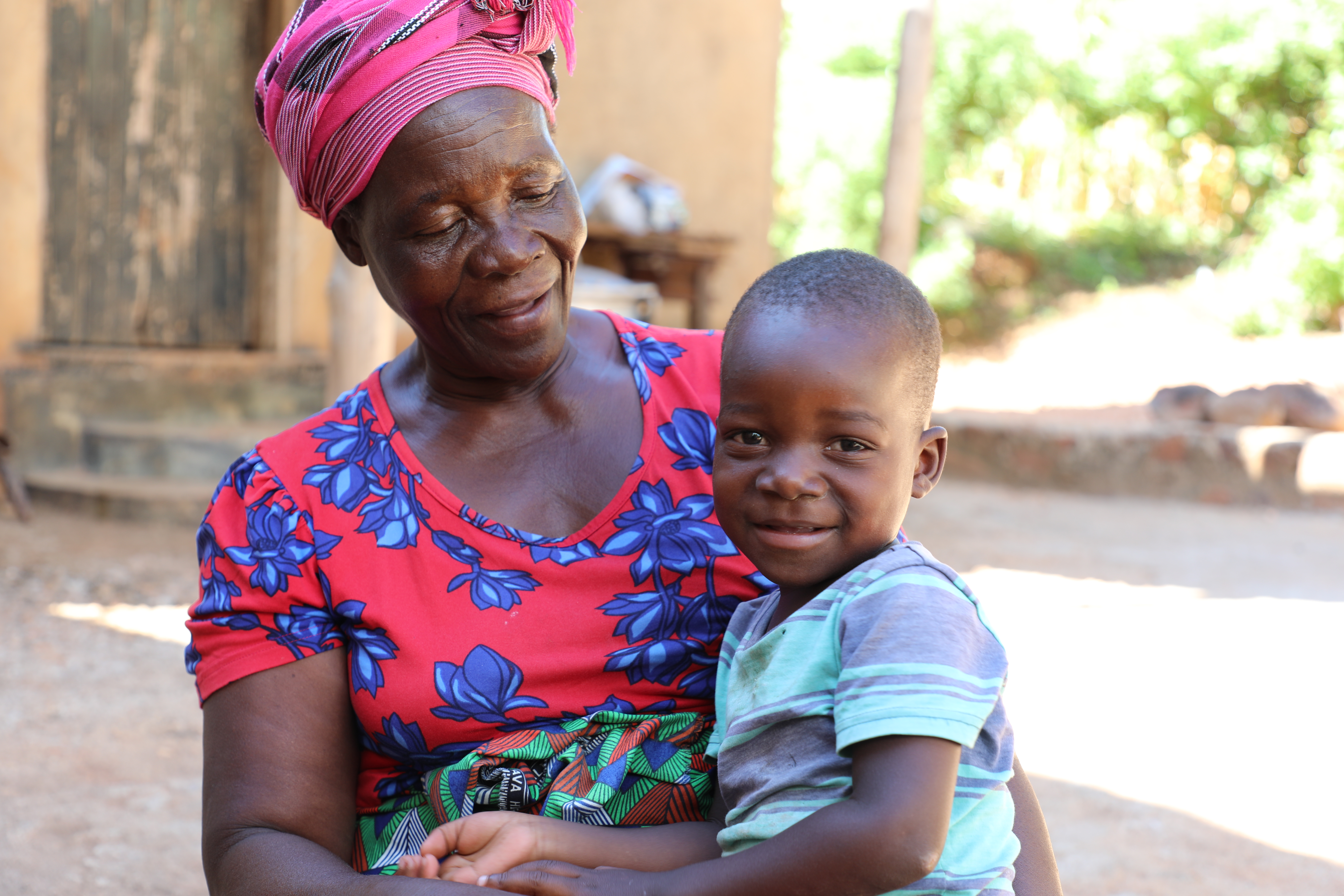 Emanuel and his grand mother smilling