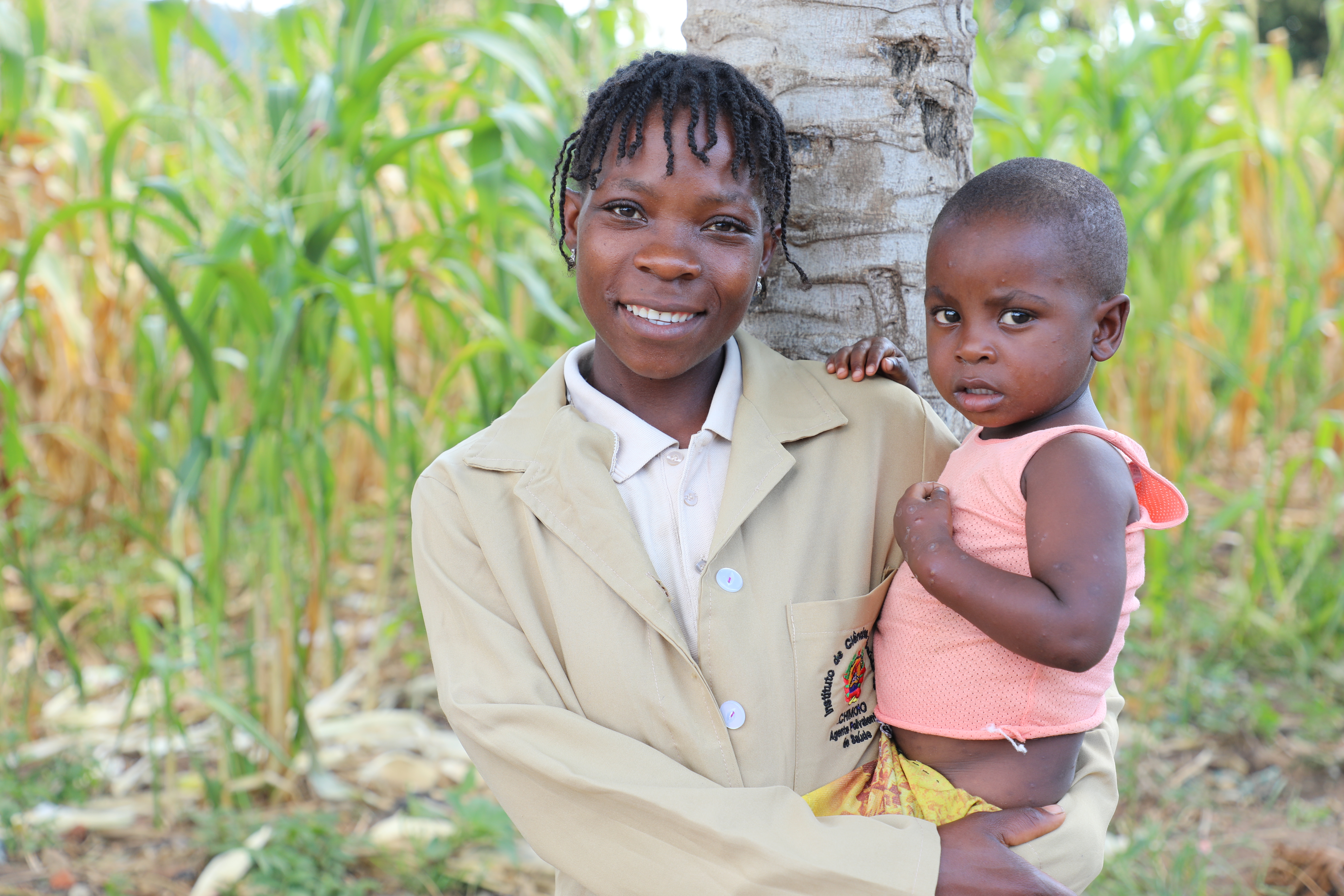 Falencia holding her son