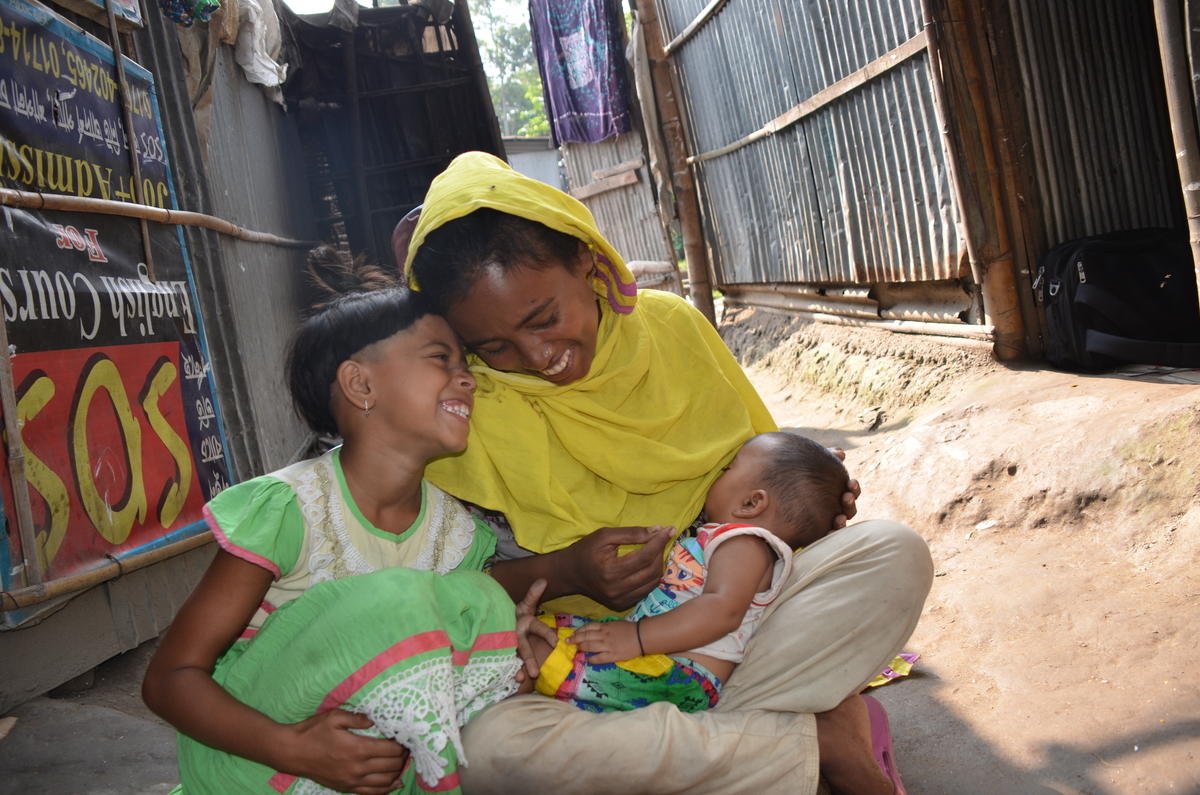 Putuli in Bangladesh breastfeeds her son.
