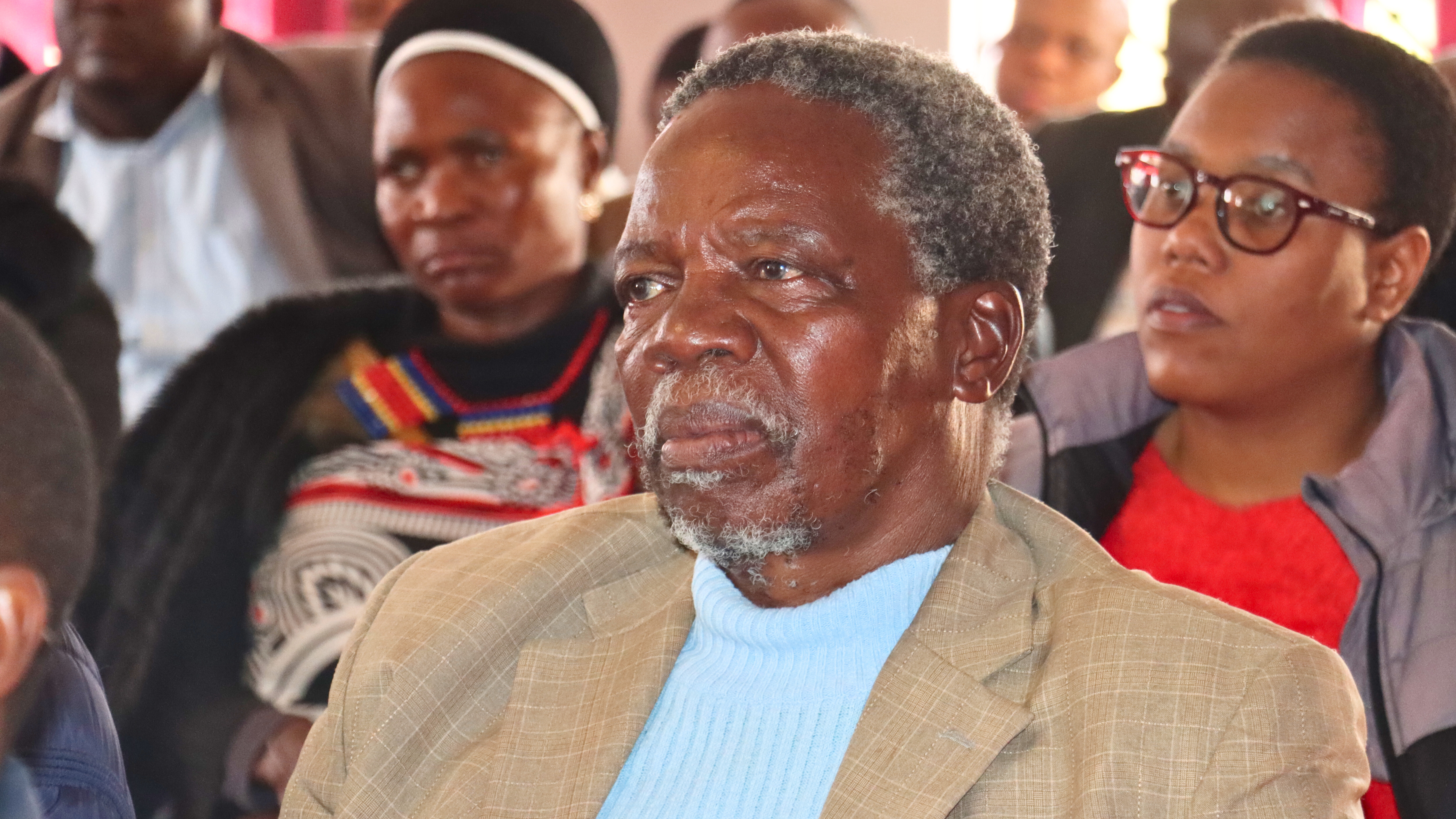 Community members listening attentively during a dissemination meeting of the Ekukhnyeni Area Programme Evaluation Report