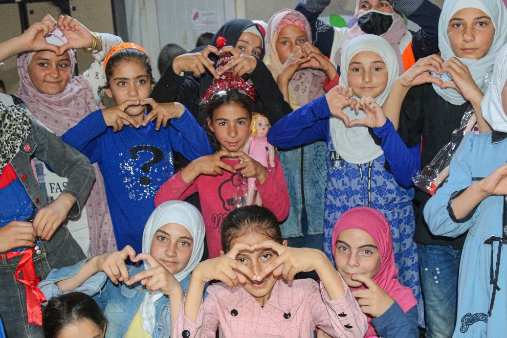 Qamar with her friends at World Vision’s protection centre in Syria.