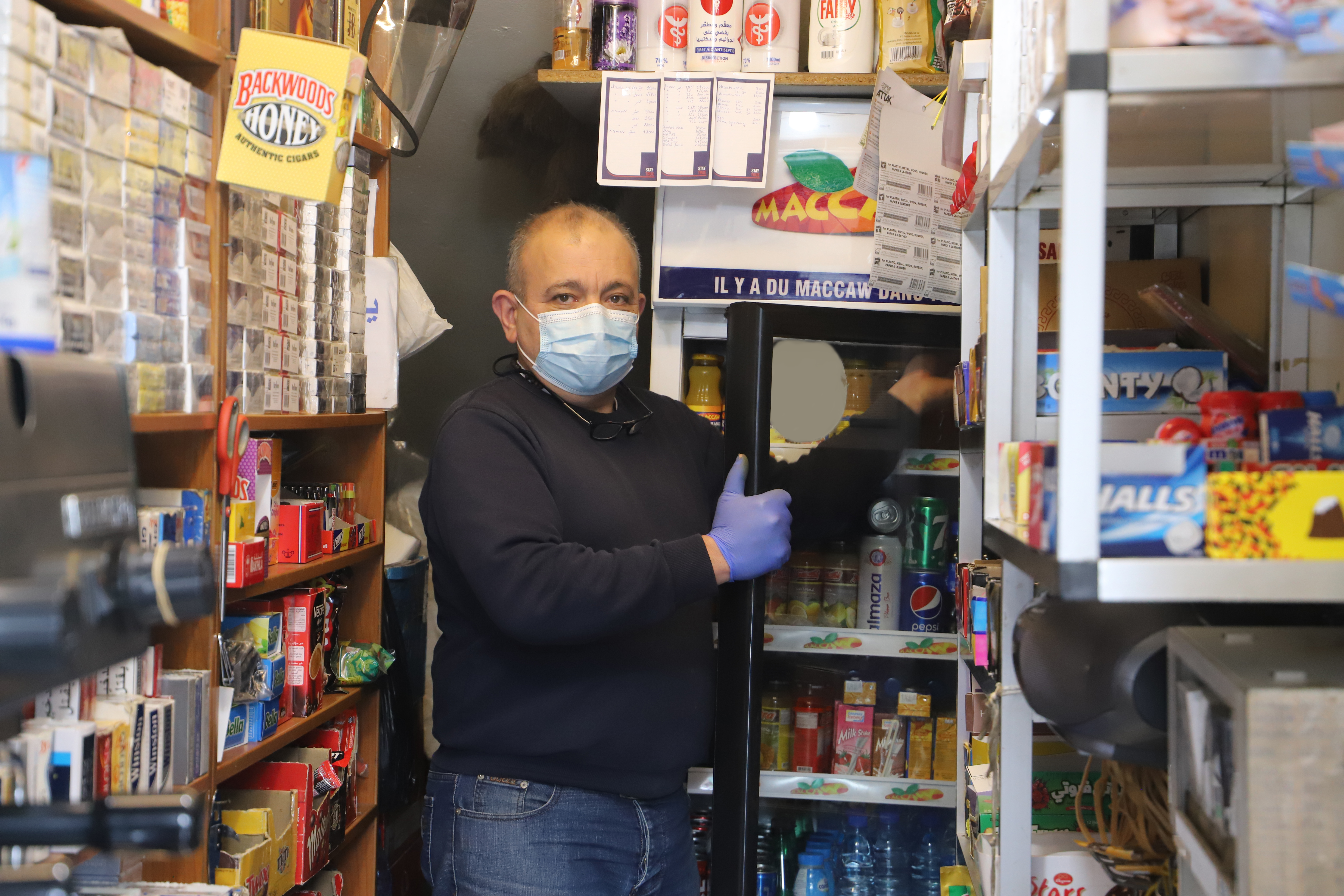 Khalil Tahan inside his small shop