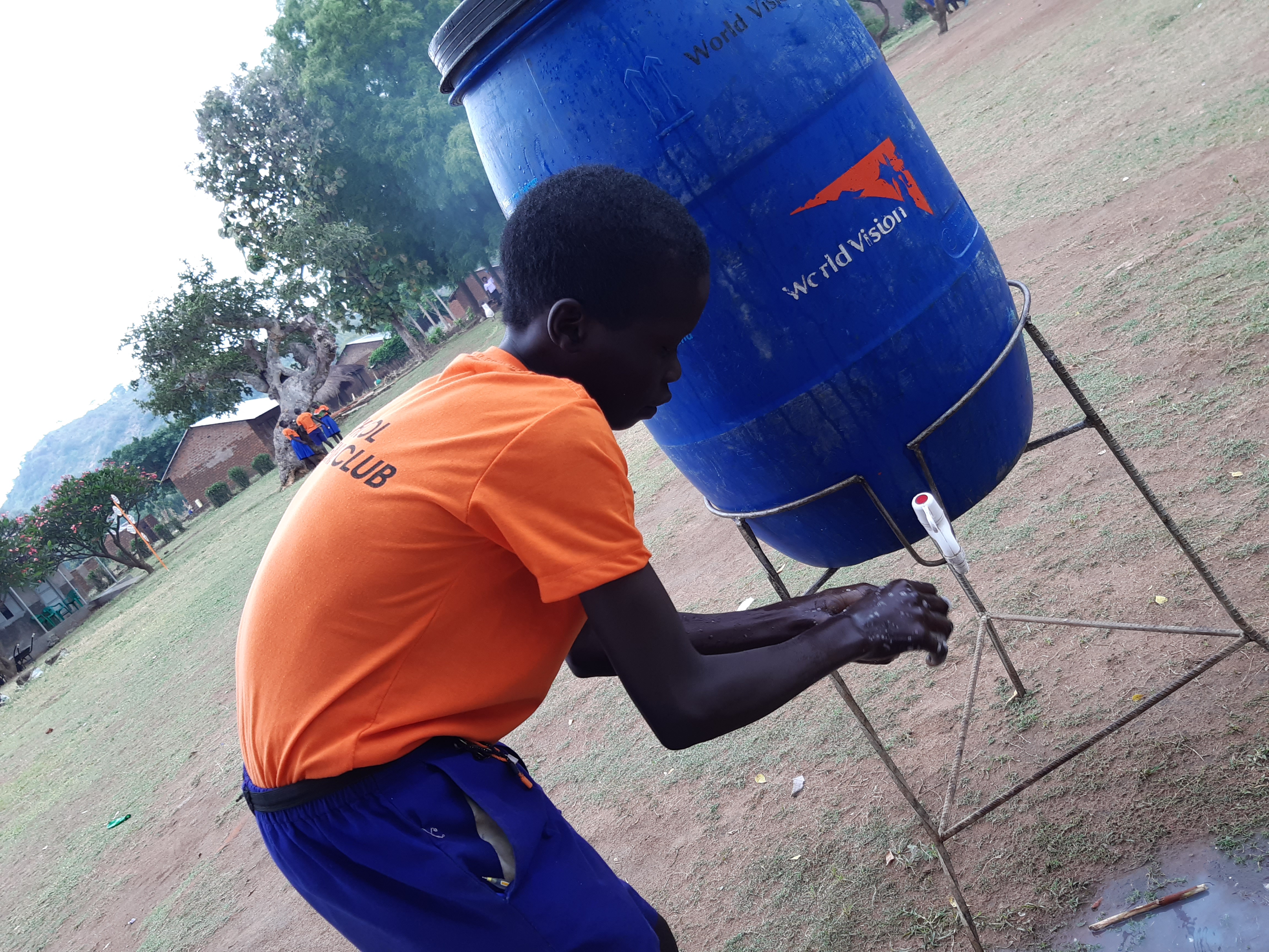 Boy washing hands