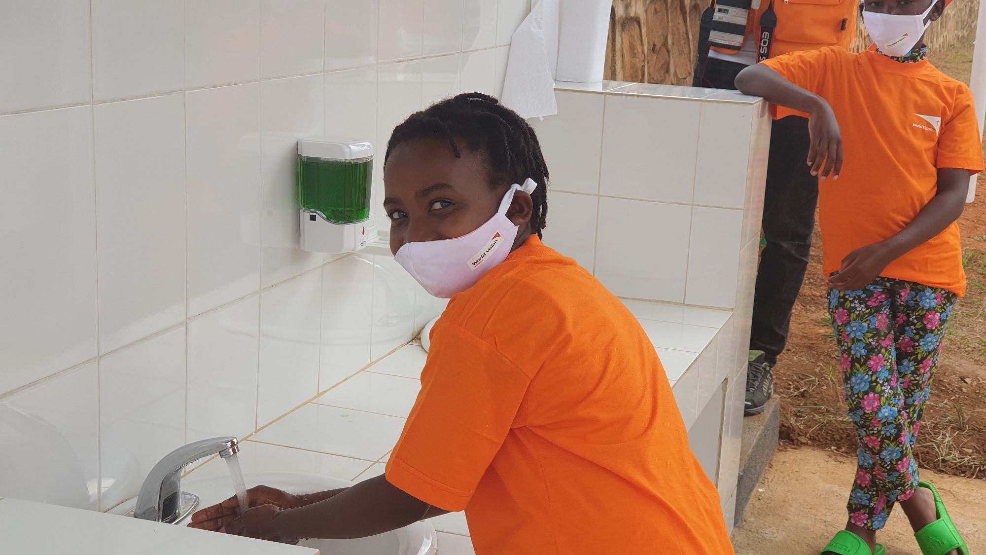 Rwandan girl washing her hands