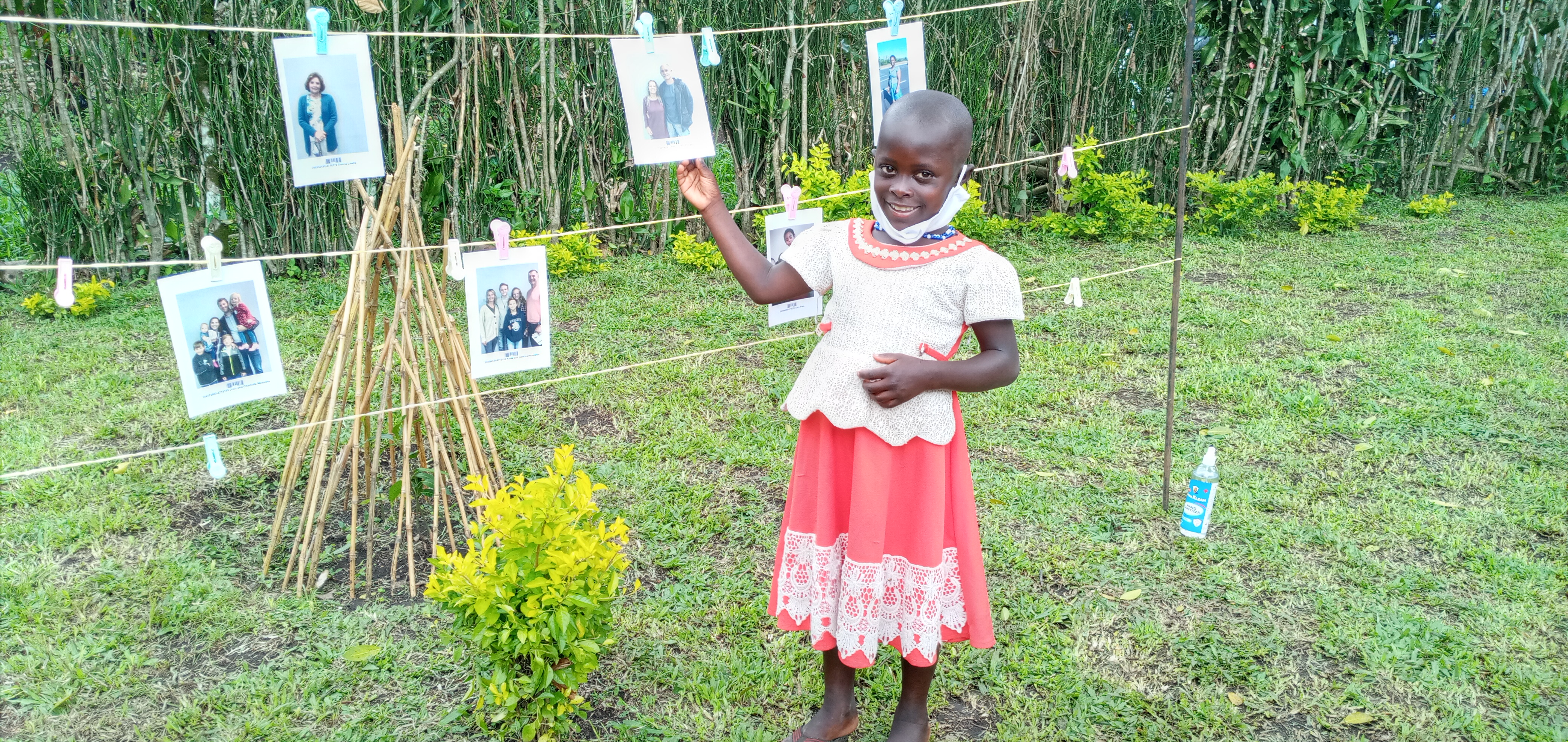 A girl chooses a sponsor during a Chosen event in Uganda. Chosen is a new invitation to child sponsorship where children are enabled to choose their sponsors.  This innovative experience puts the power to choose a sponsor in the hands of the child.
