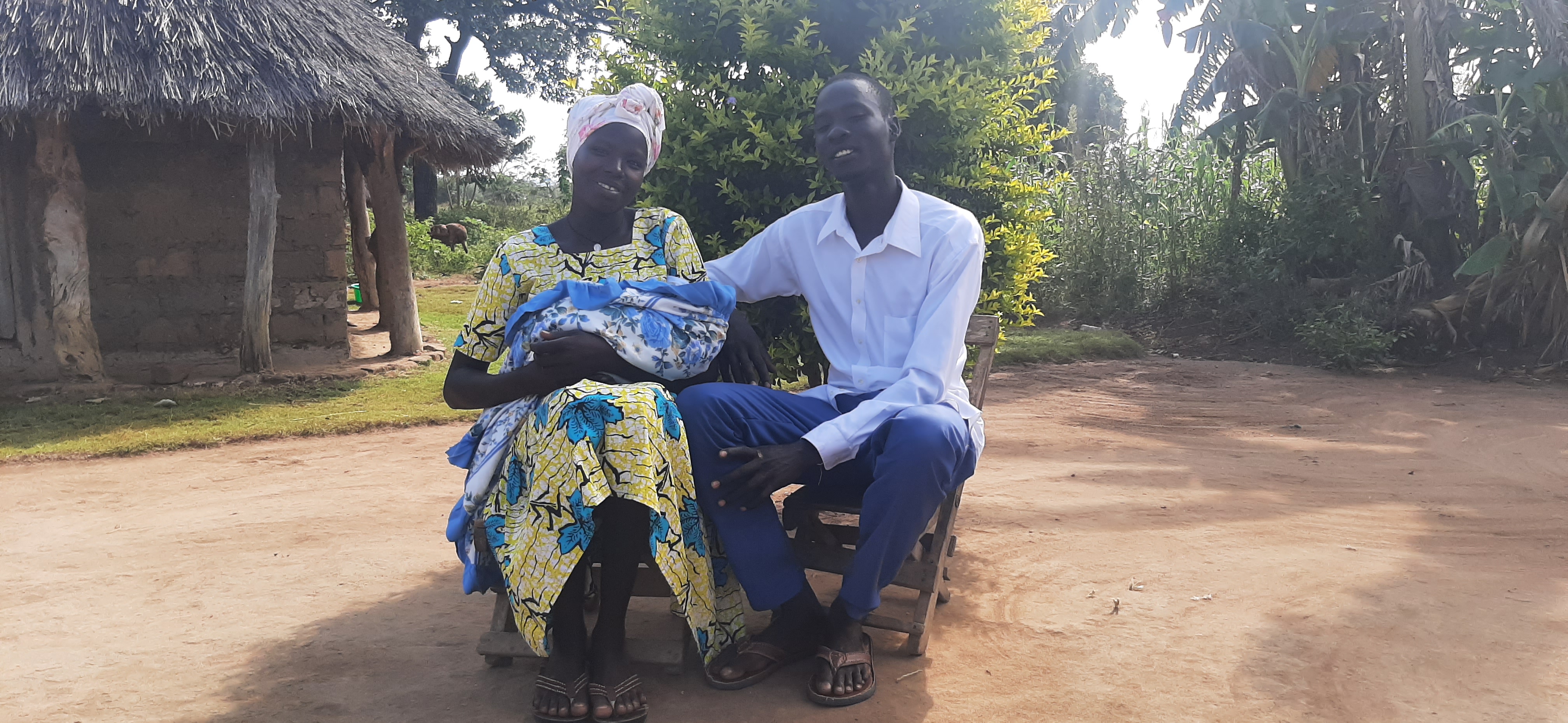 World Vision uganda health and nutrition Soroti Morungatuny VHT supporting mothers to seek health services.