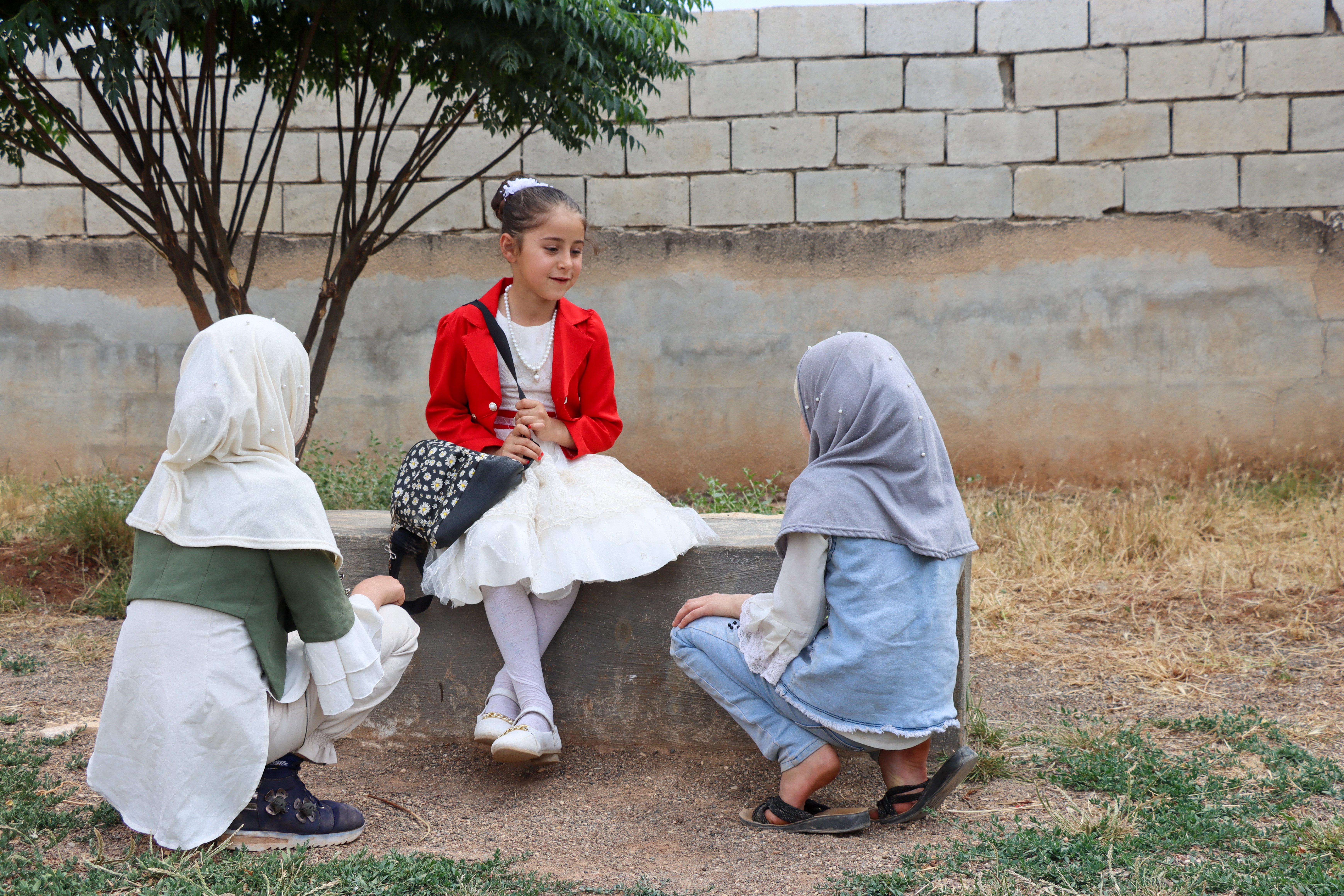 Takaful Al Sham, World Vision Partner  Sahar with two of the friends she made in school.