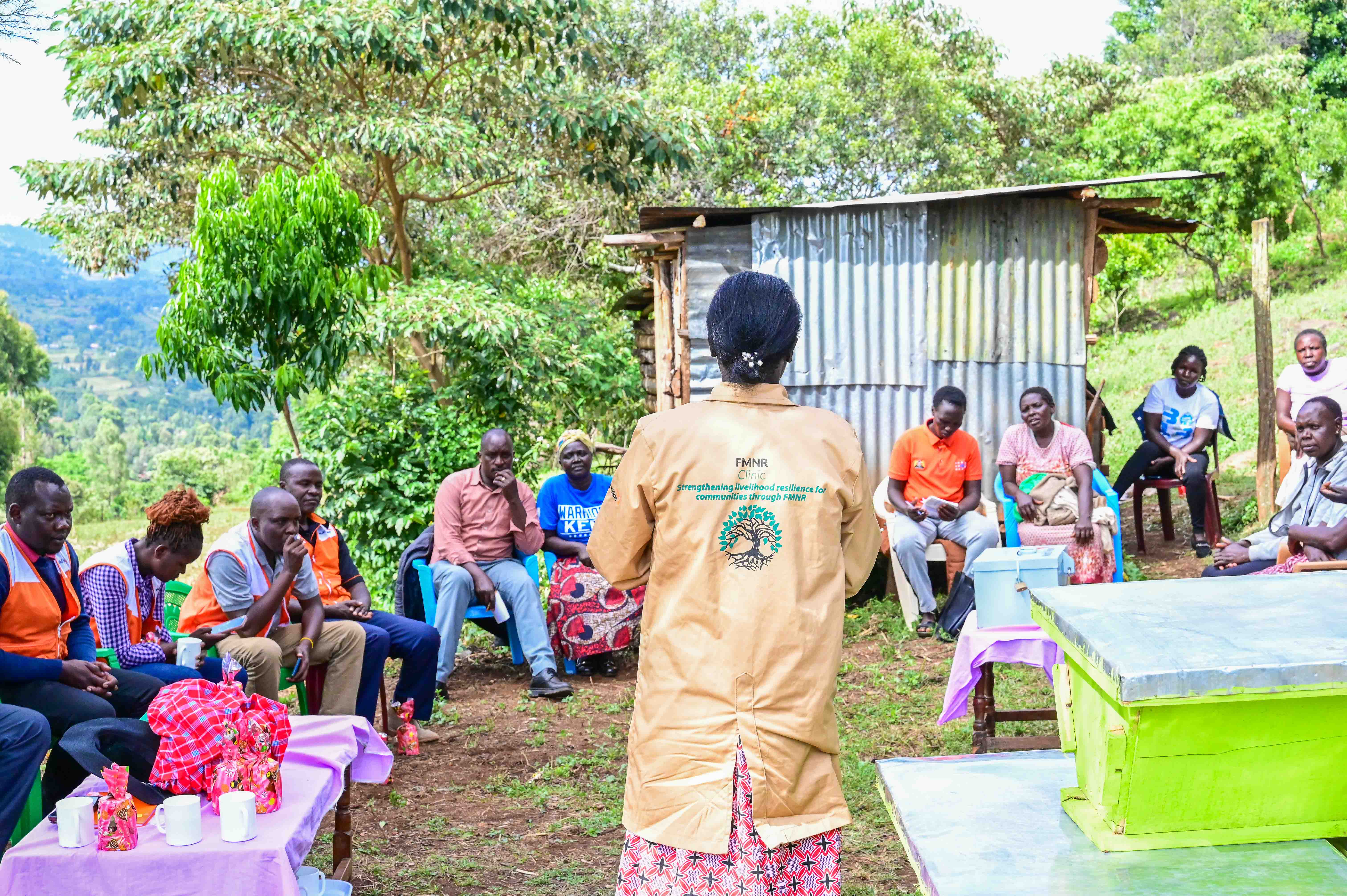 Sophia shares her insights with community members and World Vision staff, saying the trainings she received through World Vision have made her more open-minded and informed. ©World Vision Photo/Hellen Owuor