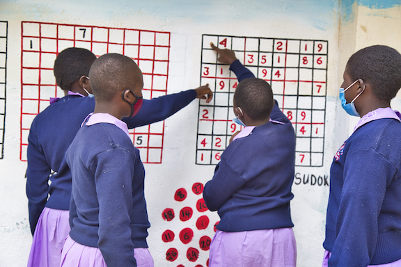 Esther is happy to be in school where she can get quality education that will allow her to achieve her dreams.©World Vision Photo/Martin Muluka.