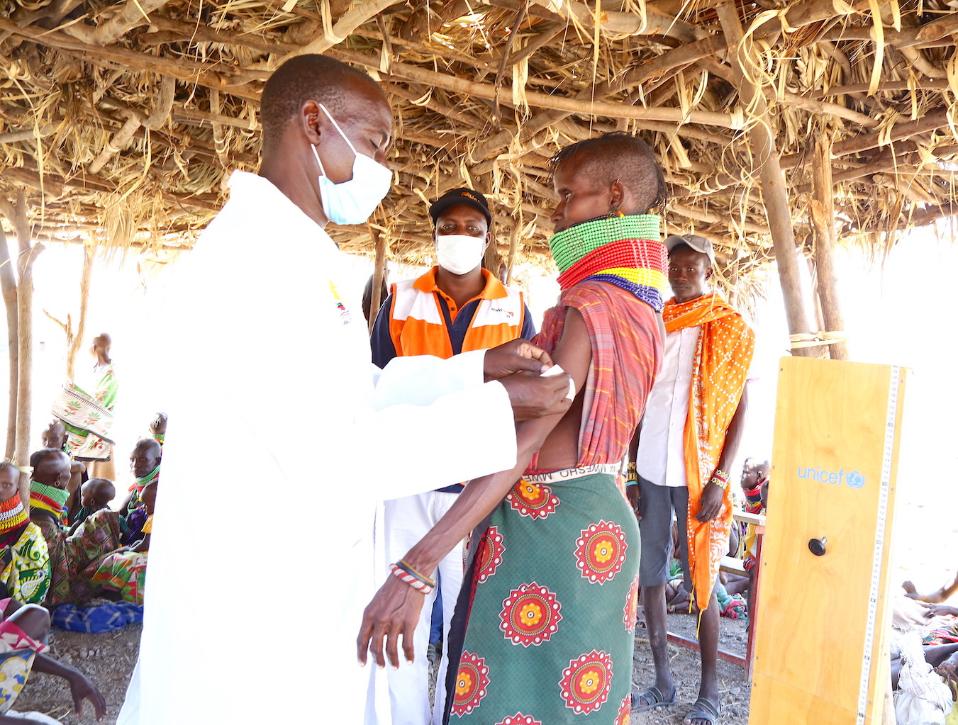 A beneficiary gets screening for malnutrition