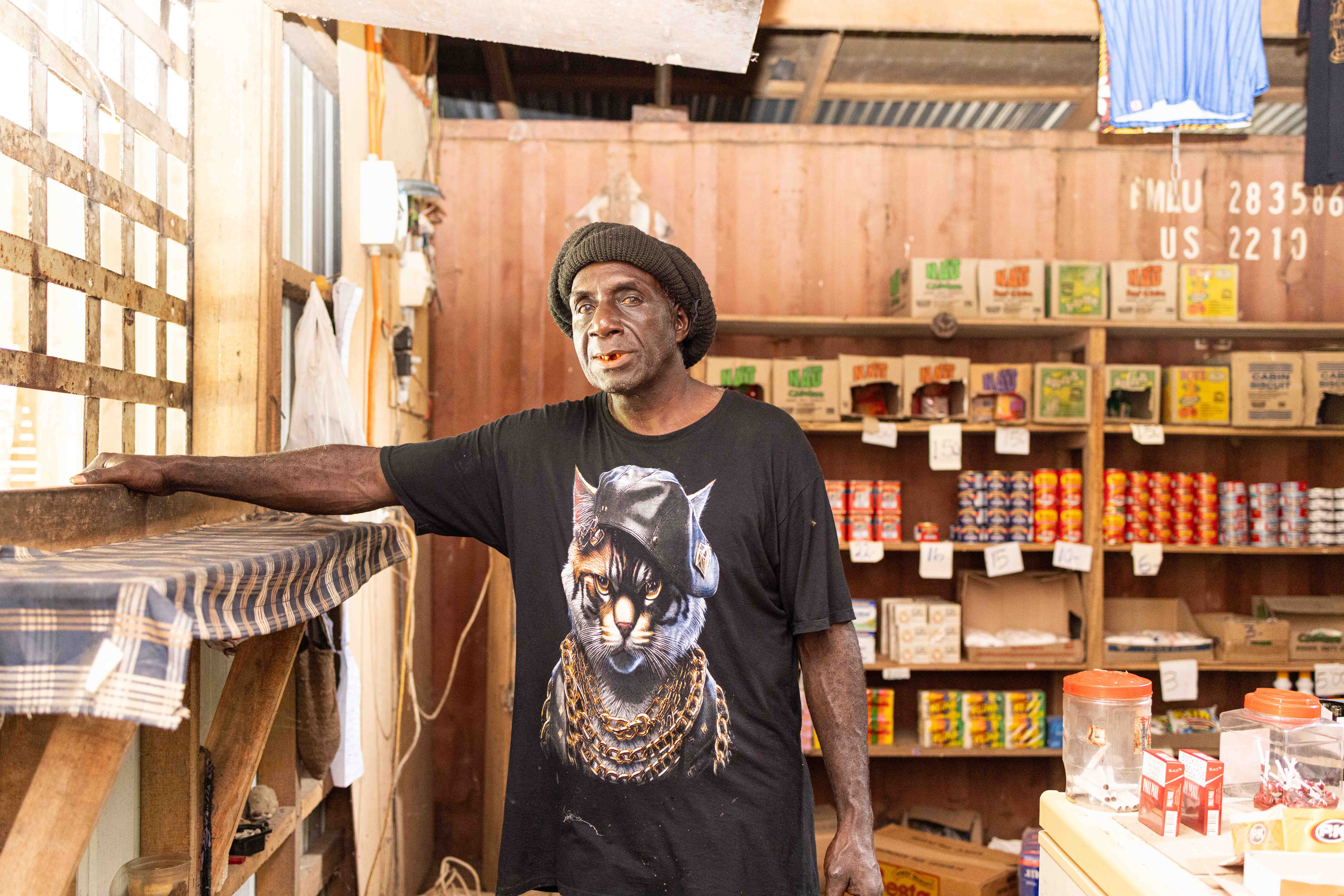 Sam proundly serving a customer in the store