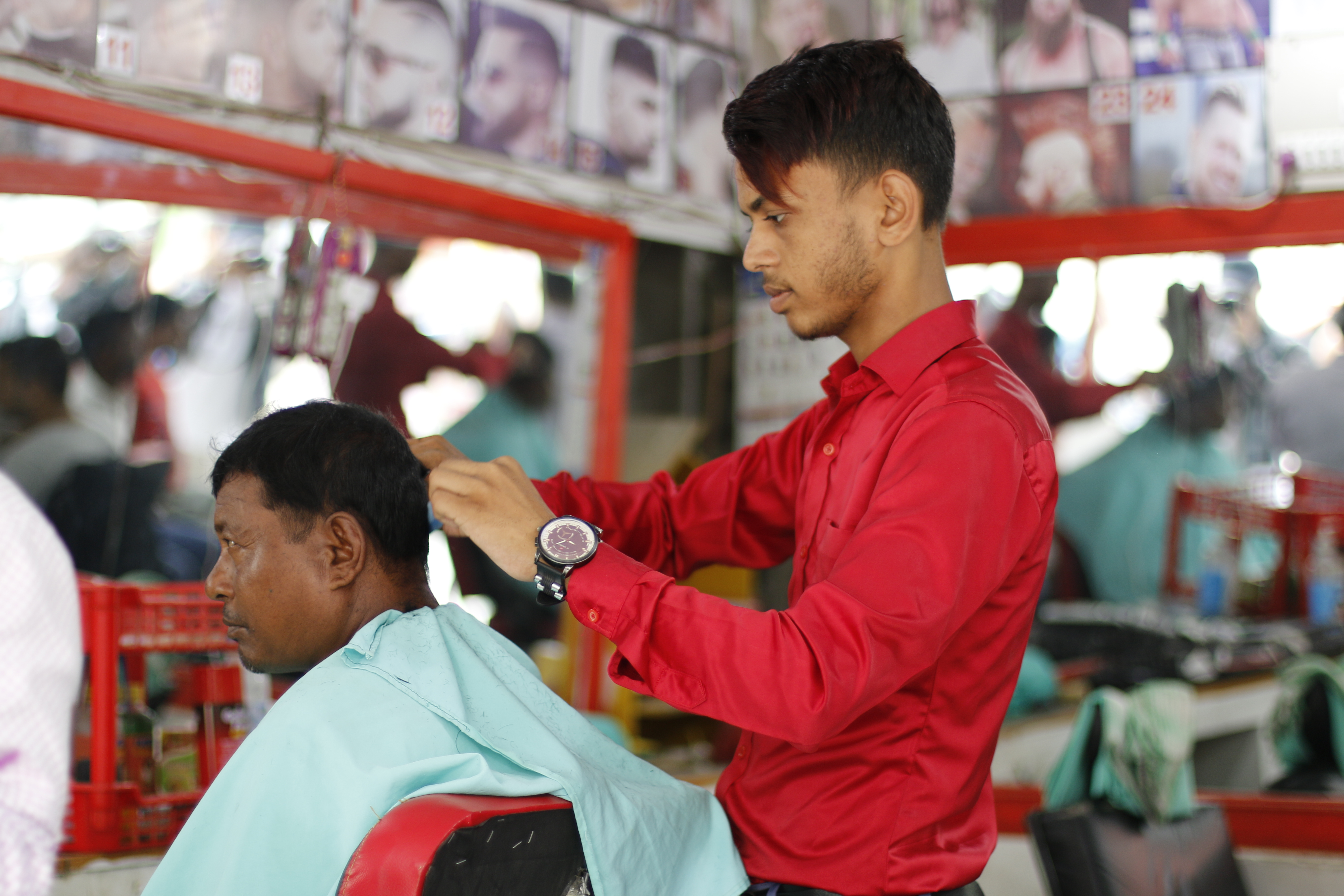 Chandan helping his father in the saloon