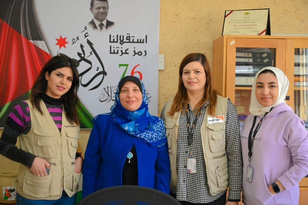 The project team along with the schools’ principal at one of the schools in Irbid city.