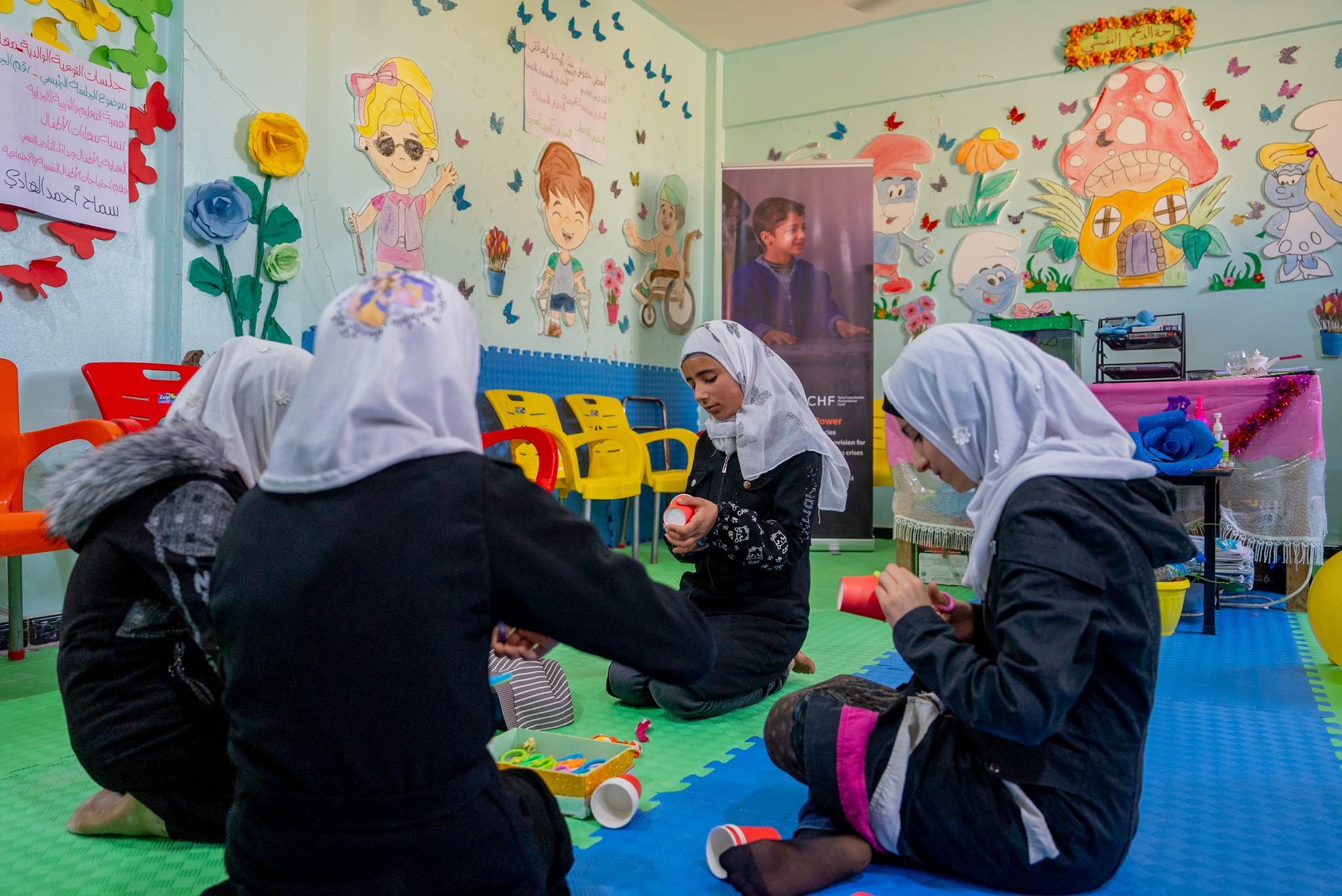 Qamar participating in a psychological support session with her friends at World Vision Syria Response Centre. World Vision Syria Response, Zaher Jaber