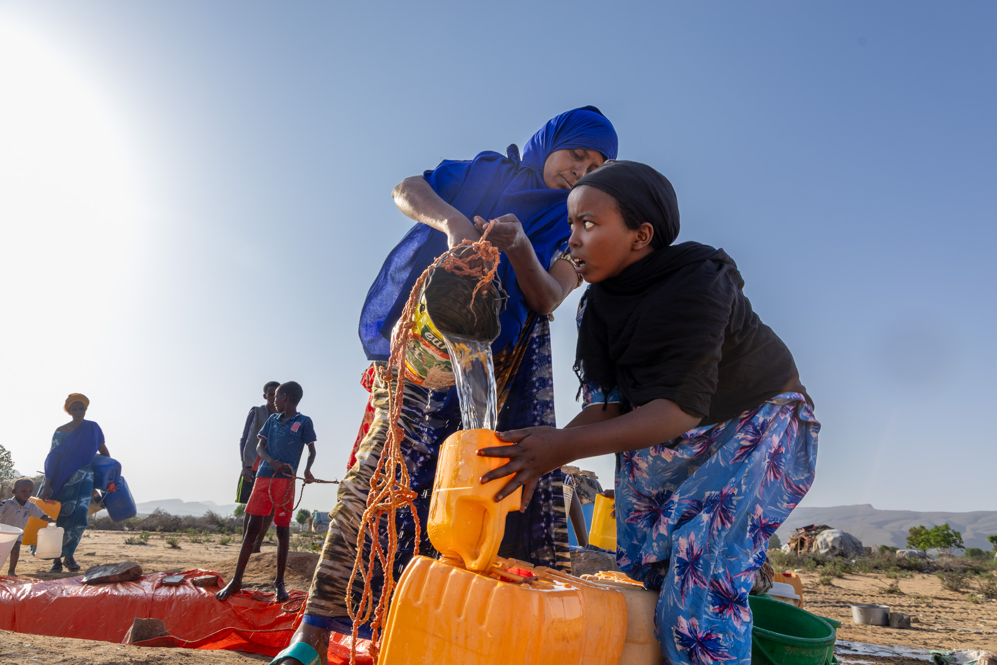 Awo and her daughter are fortunate to receive emergency water trucking from a local organisation — support that will last only a few weeks, with no certainty about what comes after it ends.