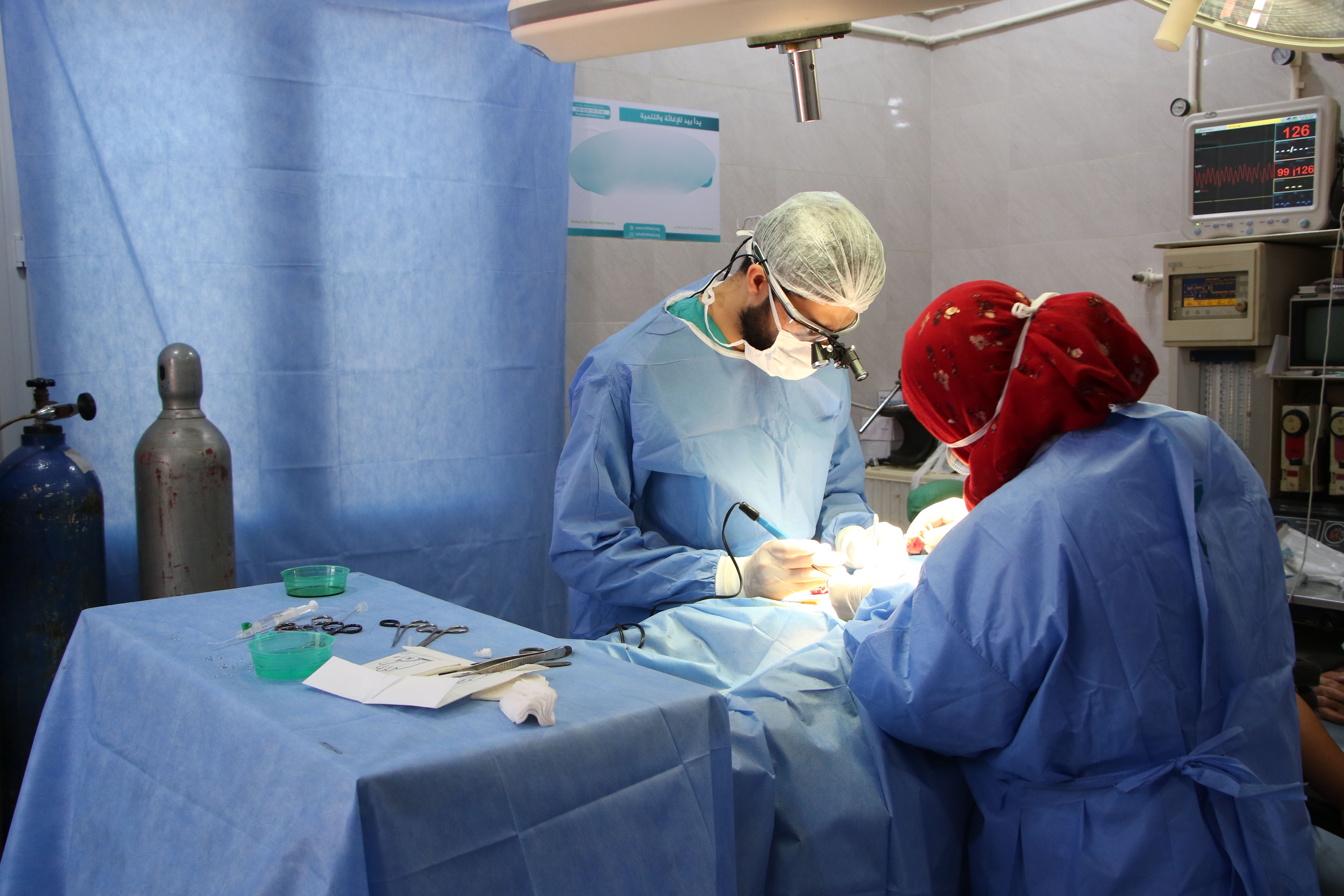 A beneficiary undergoing surgery near the stomach area at the paediatric clinic funded by EU Humanitarian Aid.
