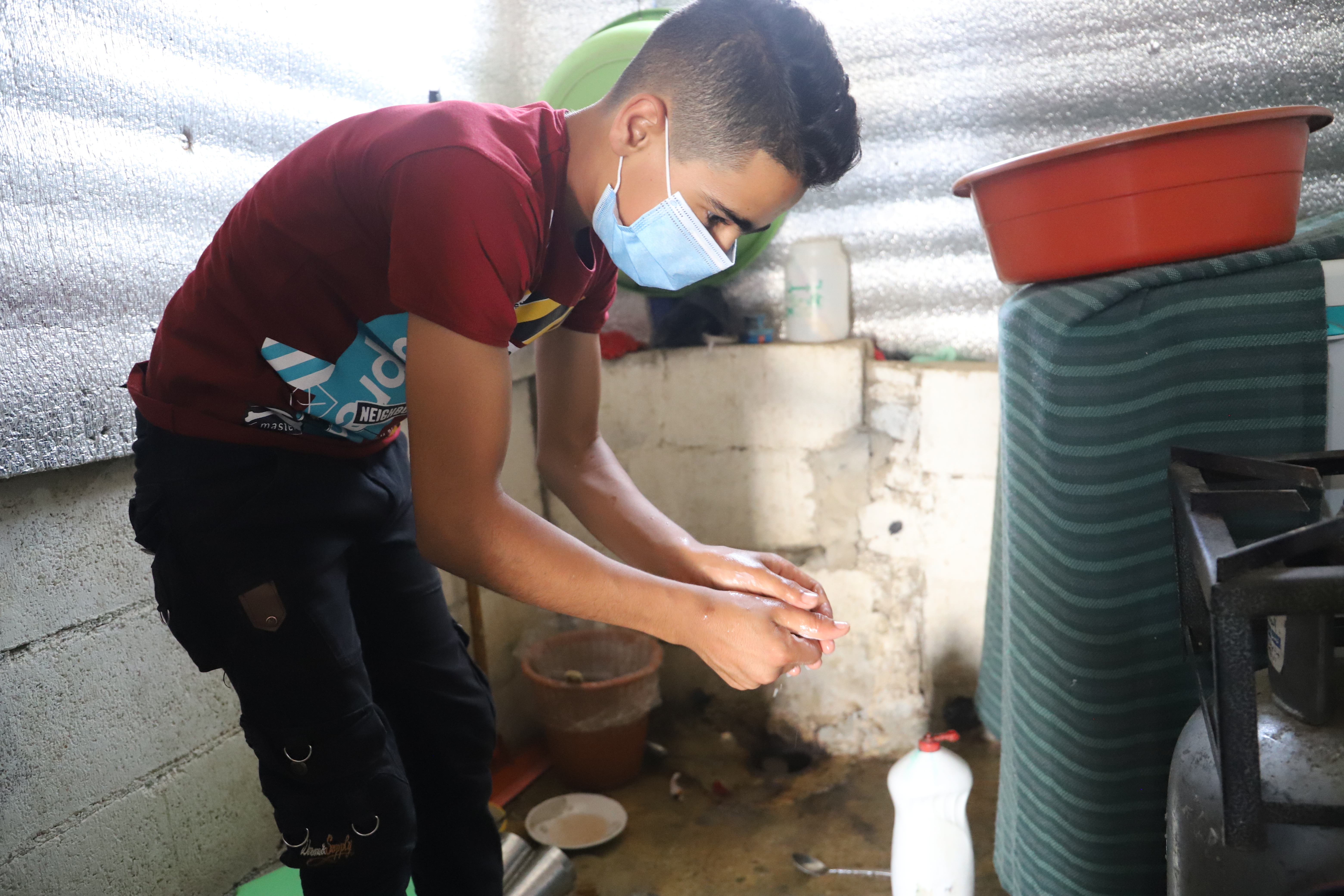 Ahmad washing his hands