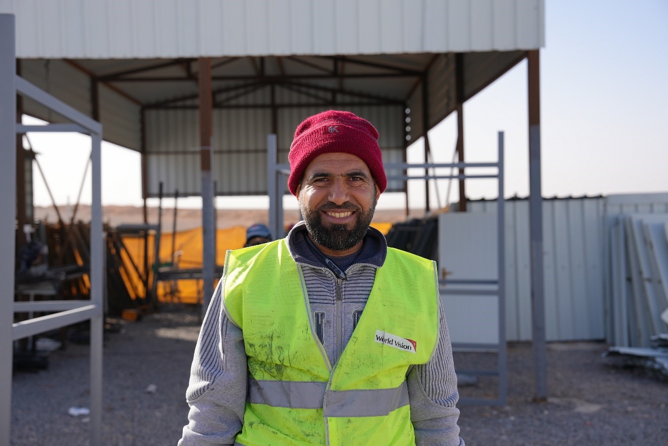 A happy Abdullah smiling for our camera