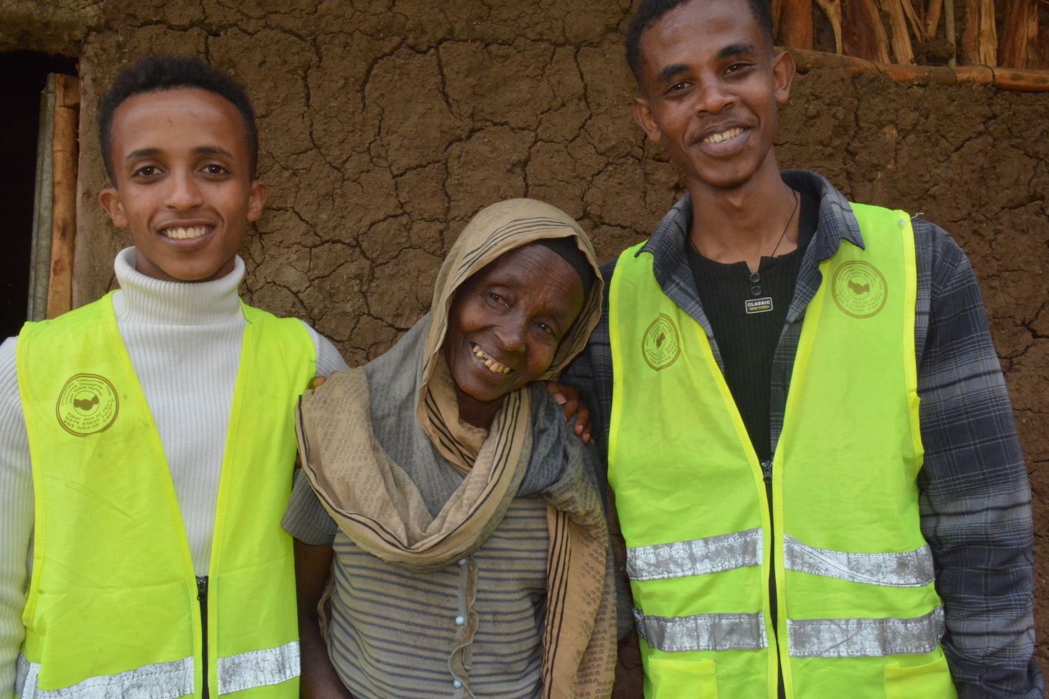 Kalid helping a community member has new shelter