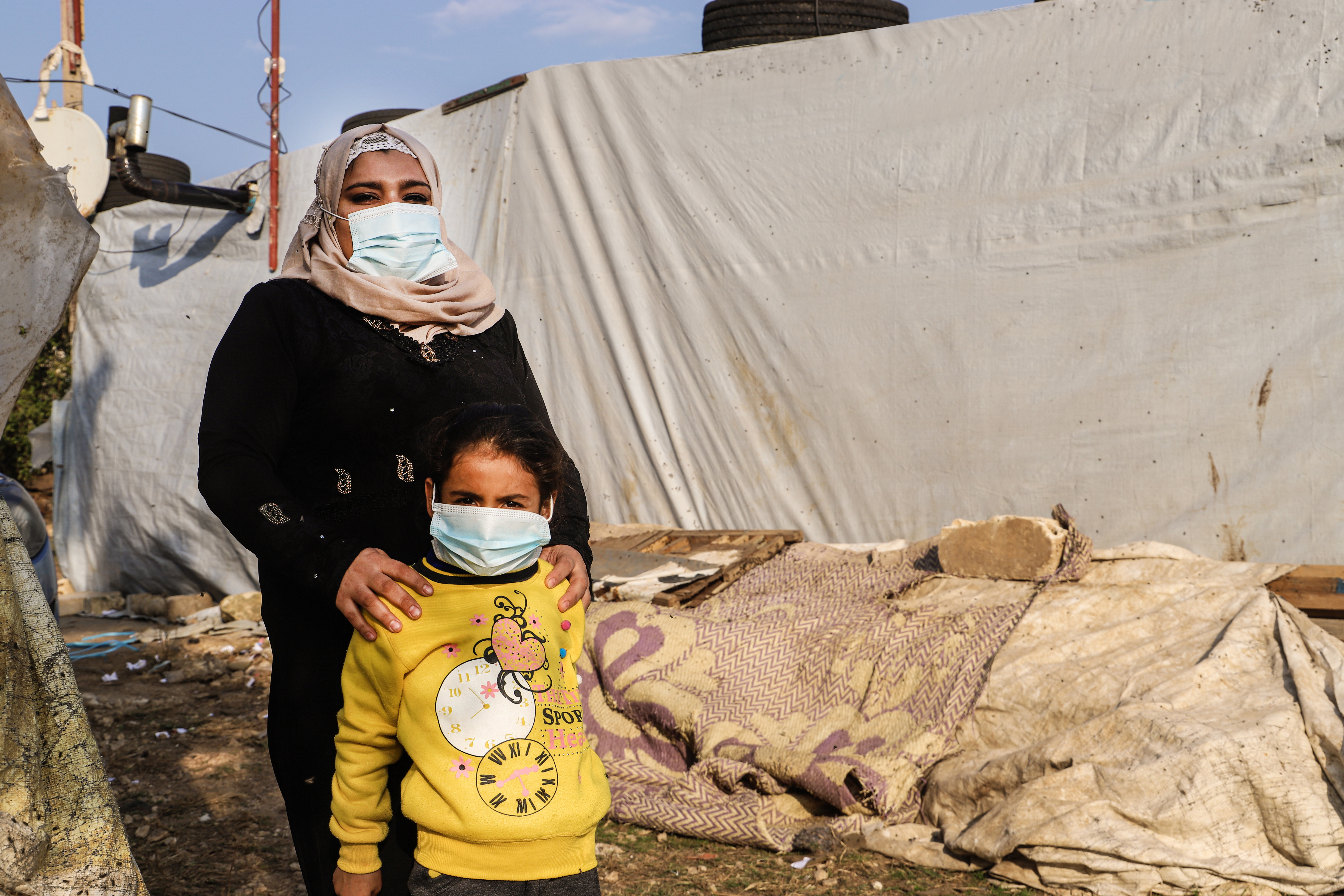 Samira and Souad infront of their tent