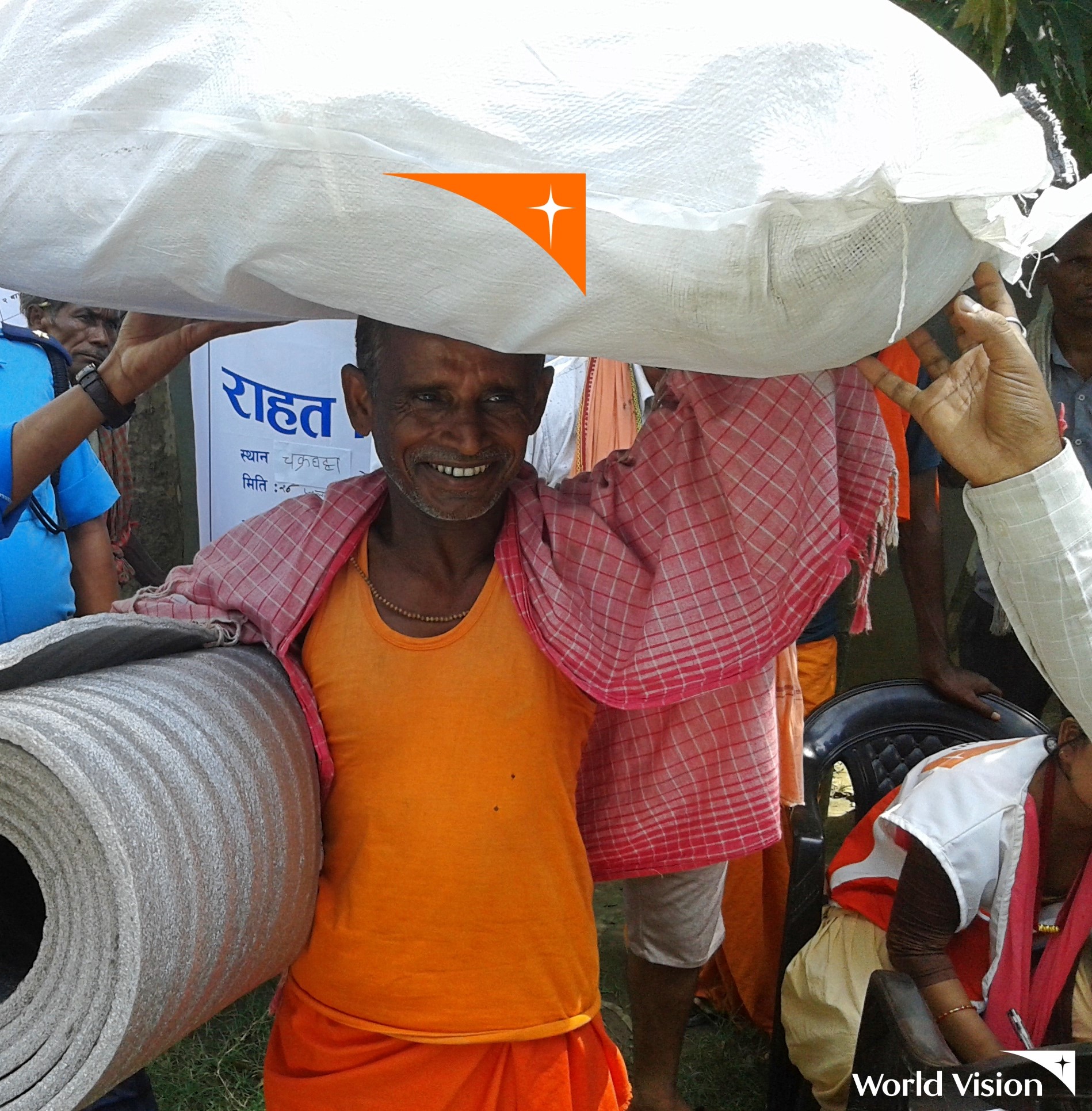 Flood-affected communities in Parsa Rural Municipality of Sarlahi district collect NFI kits distributed by WVIN