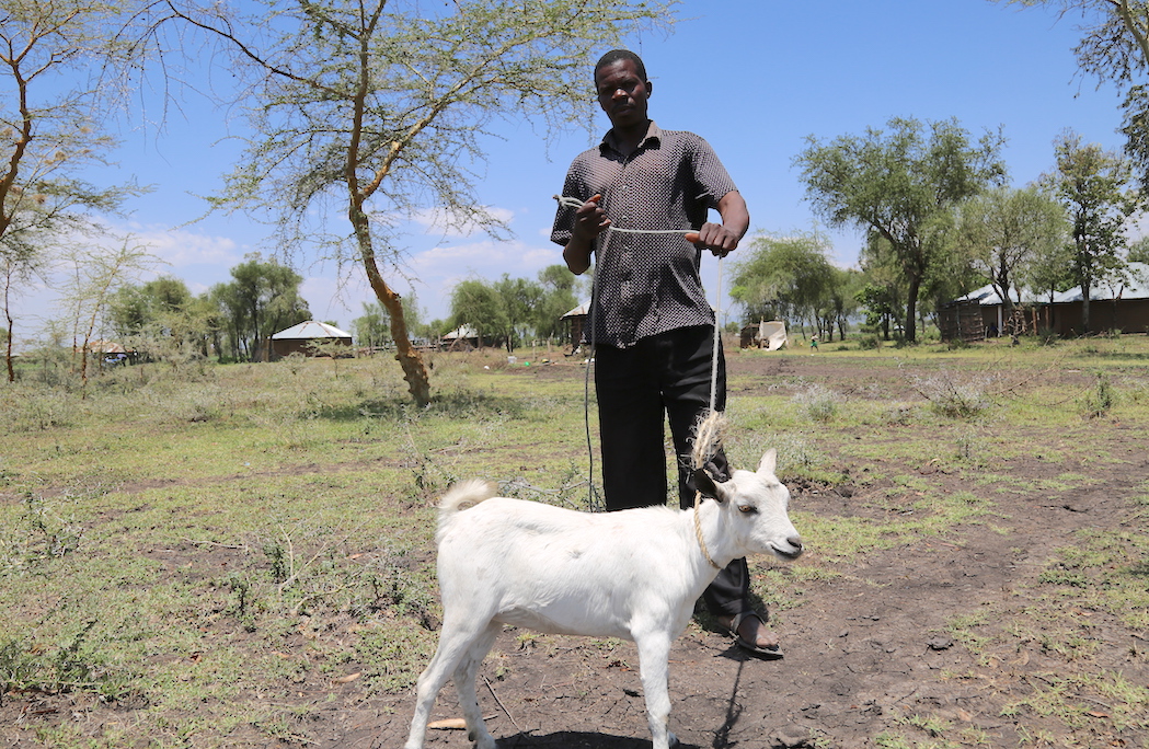 John bought a goat for livestock farming using money received from cash transfers. ©World Vision Photo/Susan Otieno