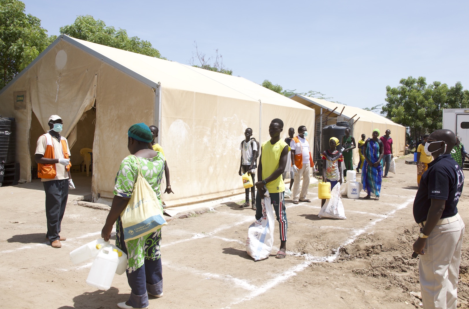 People maintaining social distancing at Kakuma Refugee Camp to stop the spread of COVID-19. ©World Vision Photo