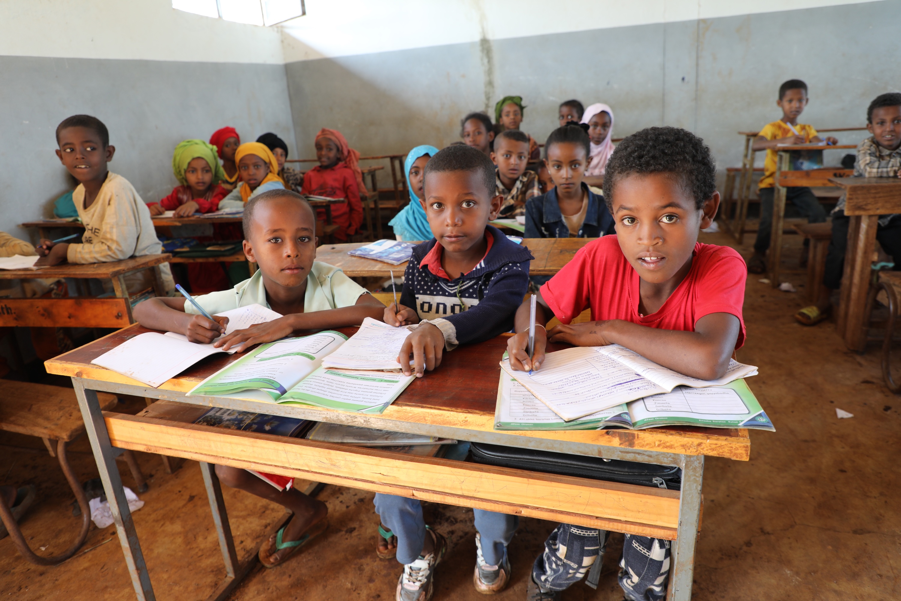 Abdi attending class at his school